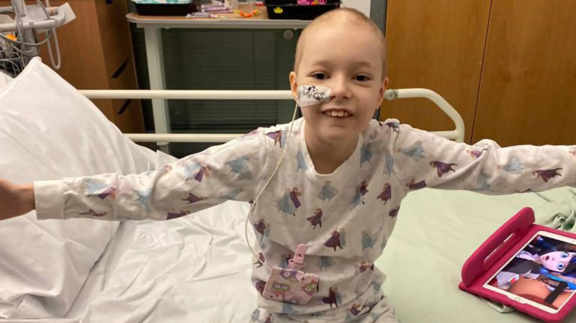 Story by Jam Press (Covid Cancer)
Pictured: Georgia in hospital where she stayed from December 2020 to February 2021 during chemo.
Schoolgirl told Covid symptoms were actually CANCER eight days before last Christmas can't wait to spend this year at home after getting all clear.
A schoolgirl who was misdiagnosed with Covid-19 when she actually had cancer has returned home for Christmas – after spending the festive season last year in hospital.
Georgia Jeffrey, nine, from Berwick-upon-Tweed, Northumberland, will be able to wake up in her own bed on Christmas morning after finally beating leukemia.
"We're all just so chuffed. We're just really going to spoil her," mum Leigh Jeffrey, 46, told Jam Press.
Georgia was diagnosed with acute lymphoblastic leukemia on 17 December 2020 – just eight days before Christmas – and was told she would spend the festive period in hospital needing treatment.
Just four weeks earlier she developed what mum Leigh and dad David, 48, thought was just a high temperature.
They contacted their local GP, who was only offering phone consultations due to the coronavirus restrictions and because of her temperature, he believed she could have Covid-19.
Georgia had a PCR test and when it was negative, they contacted the GP again, who said it sounded like a viral infection.
It was only after the fourth concerned phone call that Georgia's GP arranged a video chat.
Leigh, who is also mum to John Michael, 27, Antonia, 25, Jack, 20, Jayden, 15, said within minutes of seeing poorly Georgia, the doctor urged them to visit hospital.
She drove Georgia to their local hospital where doctors ran tests and the next morning she was transferred to Great North Children's Hospital, Newscastle, where the family were told the diagnosis just as they were preparing to celebrate Christmas.
Leigh added: "It was devastating for everybody.
"Last Christmas because of Covid only one visitor was allowed on the ward.
"So it was a case of one going while the