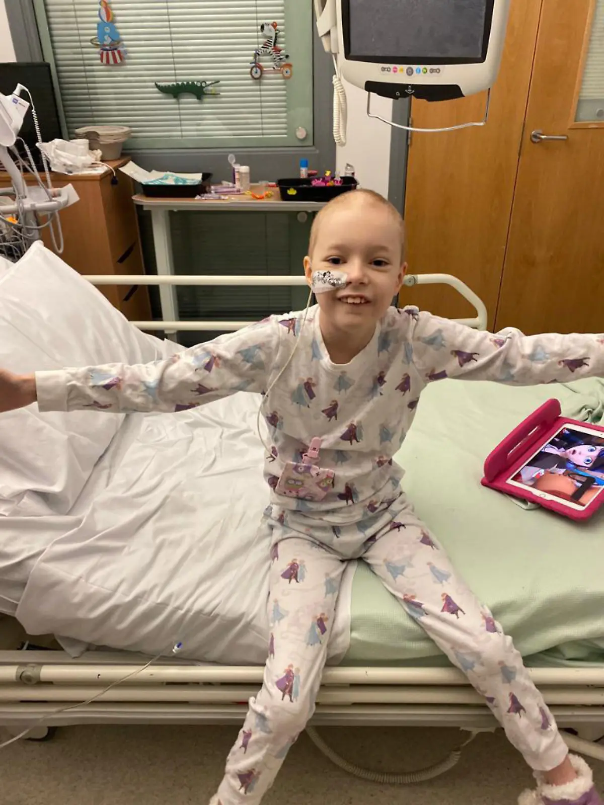 Story by Jam Press (Covid Cancer)

Pictured: Georgia in hospital where she stayed from December 2020 to February 2021 during chemo.

Schoolgirl told Covid symptoms were actually CANCER eight days before last Christmas can't wait to spend this year at home after getting all clear.

A schoolgirl who was misdiagnosed with Covid-19 when she actually had cancer has returned home for Christmas – after spending the festive season last year in hospital.

Georgia Jeffrey, nine, from Berwick-upon-Tweed, Northumberland, will be able to wake up in her own bed on Christmas morning after finally beating leukemia.

"We're all just so chuffed. We're just really going to spoil her," mum Leigh Jeffrey, 46, told Jam Press.

Georgia was diagnosed with acute lymphoblastic leukemia on 17 December 2020 – just eight days before Christmas – and was told she would spend the festive period in hospital needing treatment.

Just four weeks earlier she developed what mum Leigh and dad David, 48, thought was just a high temperature.

They contacted their local GP, who was only offering phone consultations due to the coronavirus restrictions and because of her temperature, he believed she could have Covid-19.

Georgia had a PCR test and when it was negative, they contacted the GP again, who said it sounded like a viral infection.

It was only after the fourth concerned phone call that Georgia's GP arranged a video chat.

Leigh, who is also mum to John Michael, 27, Antonia, 25, Jack, 20, Jayden, 15, said within minutes of seeing poorly Georgia, the doctor urged them to visit hospital.

She drove Georgia to their local hospital where doctors ran tests and the next morning she was transferred to Great North Children's Hospital, Newscastle, where the family were told the diagnosis just as they were preparing to celebrate Christmas.

Leigh added: "It was devastating for everybody.

"Last Christmas because of Covid only one visitor was allowed on the ward.

"So it was a case of one going while the 