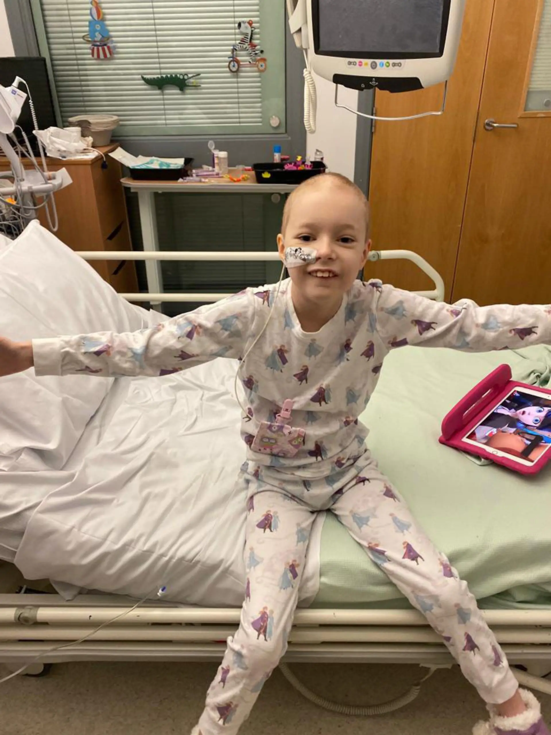 Story by Jam Press (Covid Cancer)

Pictured: Georgia in hospital where she stayed from December 2020 to February 2021 during chemo.

Schoolgirl told Covid symptoms were actually CANCER eight days before last Christmas can't wait to spend this year at home after getting all clear.

A schoolgirl who was misdiagnosed with Covid-19 when she actually had cancer has returned home for Christmas – after spending the festive season last year in hospital.

Georgia Jeffrey, nine, from Berwick-upon-Tweed, Northumberland, will be able to wake up in her own bed on Christmas morning after finally beating leukemia.

"We're all just so chuffed. We're just really going to spoil her," mum Leigh Jeffrey, 46, told Jam Press.

Georgia was diagnosed with acute lymphoblastic leukemia on 17 December 2020 – just eight days before Christmas – and was told she would spend the festive period in hospital needing treatment.

Just four weeks earlier she developed what mum Leigh and dad David, 48, thought was just a high temperature.

They contacted their local GP, who was only offering phone consultations due to the coronavirus restrictions and because of her temperature, he believed she could have Covid-19.

Georgia had a PCR test and when it was negative, they contacted the GP again, who said it sounded like a viral infection.

It was only after the fourth concerned phone call that Georgia's GP arranged a video chat.

Leigh, who is also mum to John Michael, 27, Antonia, 25, Jack, 20, Jayden, 15, said within minutes of seeing poorly Georgia, the doctor urged them to visit hospital.

She drove Georgia to their local hospital where doctors ran tests and the next morning she was transferred to Great North Children's Hospital, Newscastle, where the family were told the diagnosis just as they were preparing to celebrate Christmas.

Leigh added: "It was devastating for everybody.

"Last Christmas because of Covid only one visitor was allowed on the ward.

"So it was a case of one going while the 