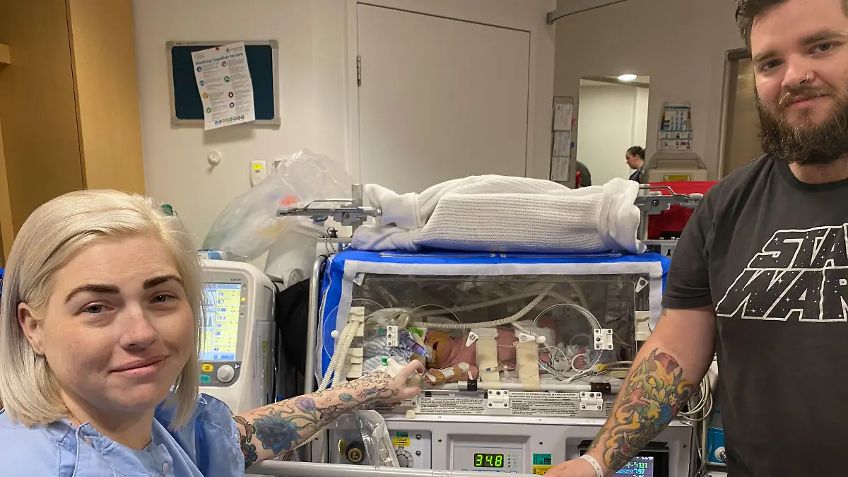 Carissa Morris / CATERS NEWS (PICTURED L-R Carissa, with Oliver and Dave in the hospital) A couple have welcomed a beautiful baby boy just in time for Christmas after 13 years of trying. Carissa Morris, 33, and her husband Dave, 32 welcomed their beautiful miracle Oliver on the 17th of December, 2021 after 13 years of trying. After a heartbreaking eight miscarriages and the stillbirth of Carissa's beautiful daughter, the Wickham, Western Australian couple finally fell pregnant in April of this year, after only one round of ICSI IVF. Oliver was born at St John of God Murdoch hospital at a healthy 6lb 7oz. SEE CATERS COPY