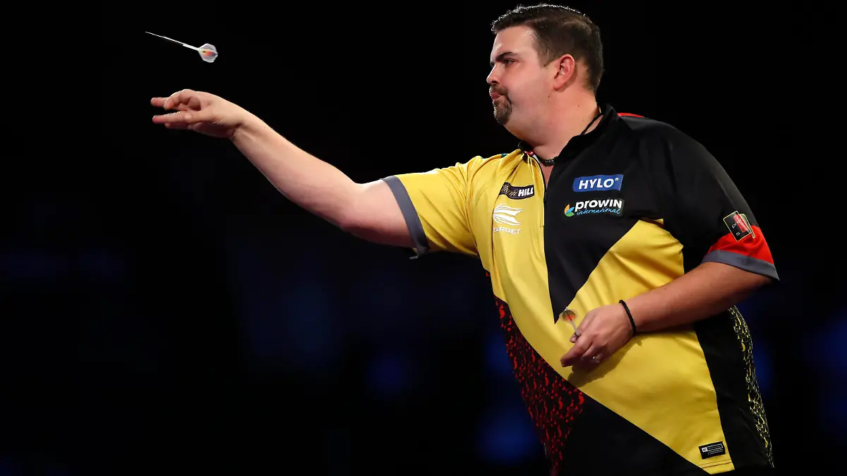 LONDON, ENGLAND - DECEMBER 23: Gabriel Clemens of Germany in action during his Round Two Match against Lewy Williams of Wales during Day Nine of The William Hill World Darts Championship at Alexandra Palace on December 23, 2021 in London, England. (Photo by Luke Walker/Getty Images)
