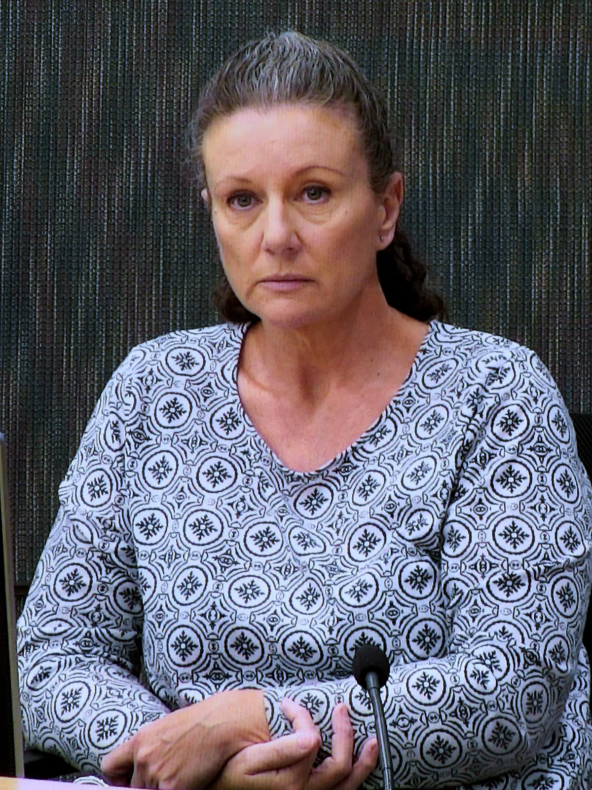 ARCHIV - 01.05.2019, Australien, Sydney: Kathleen Folbigg erscheint via Videoverbindung während einer Untersuchung zur Verurteilung am NSW Coroners Court. Folbigg, die wegen Mordes ihrer vier Kinder verurteilt wurde, wurde nach 20 Jahren Haft begnadigt. Neue wissenschaftliche Erkenntnisse hätten ergeben, dass die zwei Jungen und zwei Mädchen möglicherweise wirklich eines natürlichen Todes gestorben seien, wie Folbigg stets behauptet hatte, sagte der Generalstaatsanwalt des Bundesstaates New South Wales, Daley, am 05.06.2023. Foto: Joel Carrett/AAPIMAGE/AP +++ dpa-Bildfunk +++