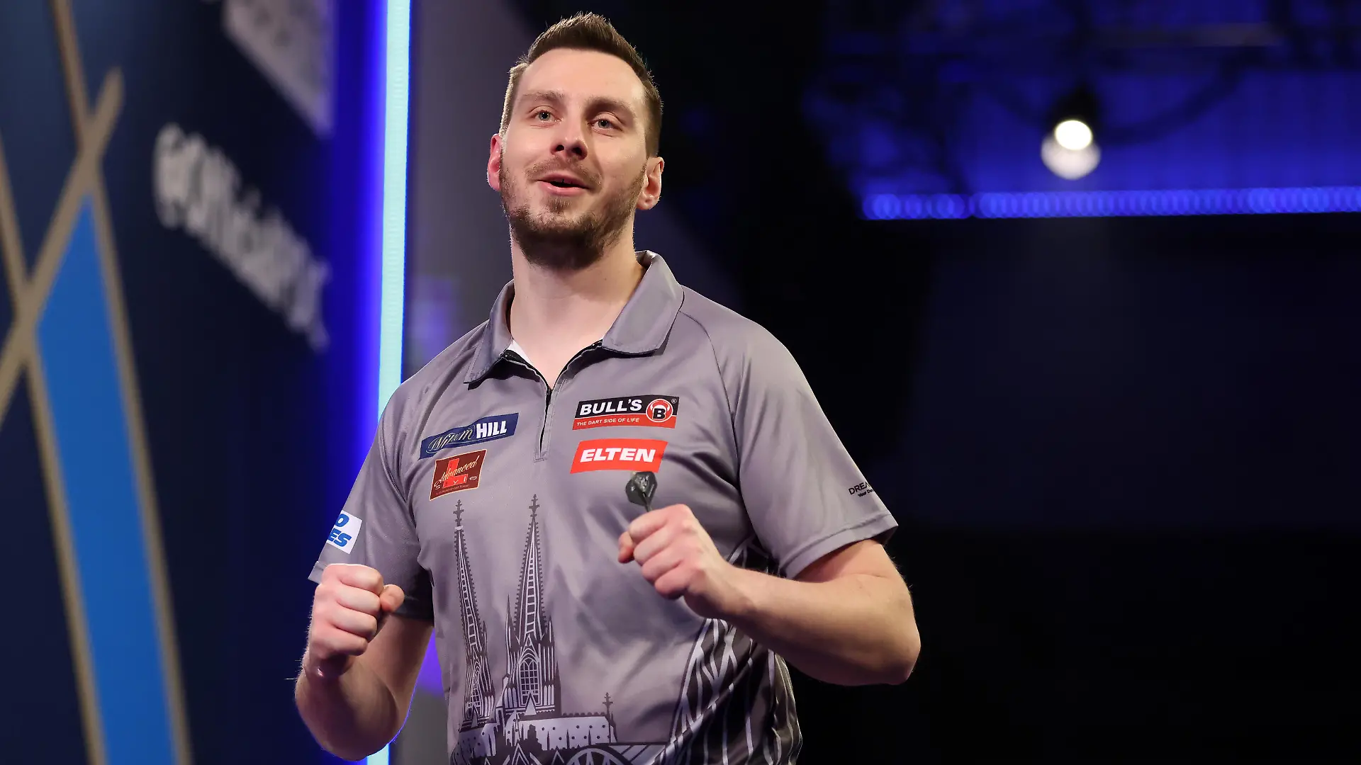 LONDON, ENGLAND - DECEMBER 21: Florian Hempel of Germany in action during his Second Round Match against Dimitri Van den Bergh of Belgium during Day Seven of The William Hill World Darts Championship at Alexandra Palace on December 21, 2021 in London, England. (Photo by Luke Walker/Getty Images)