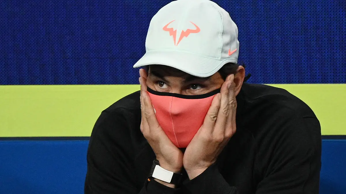  TENNIS ATP, Tennis Herren CUP, Rafael Nadal of Team Spain wears his face mask as he watches team mate Pablo Carreno Busta play Fabio Fignini of Italy during the semi-finals of the ATP Cup at Melbourne Park in Melbourne, Saturday, February 6, 2021.  ACHTUNG: NUR REDAKTIONELLE NUTZUNG, KEINE ARCHIVIERUNG UND KEINE BUCHNUTZUNG MELBOURNE VIC AUSTRALIA PUBLICATIONxINxGERxSUIxAUTxONLY Copyright: xDEANxLEWINSx 20210206001518620664