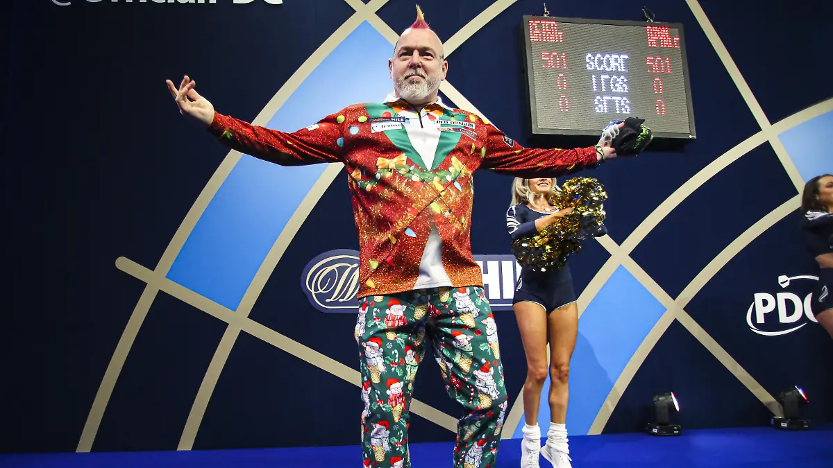 William Hill World Darts Championship 2021/22 - Day Three - Alexandra Palace. Peter Wright on stage during day three of the William Hill World Darts Championship at Alexandra Palace, London. Picture date: Friday December 17, 2021. See PA story DARTS World. Photo credit should read: Kieran Cleeves/PA Wire. RESTRICTIONS: Use subject to restrictions. Editorial use only, no commercial use without prior consent from rights holder. URN:64398684