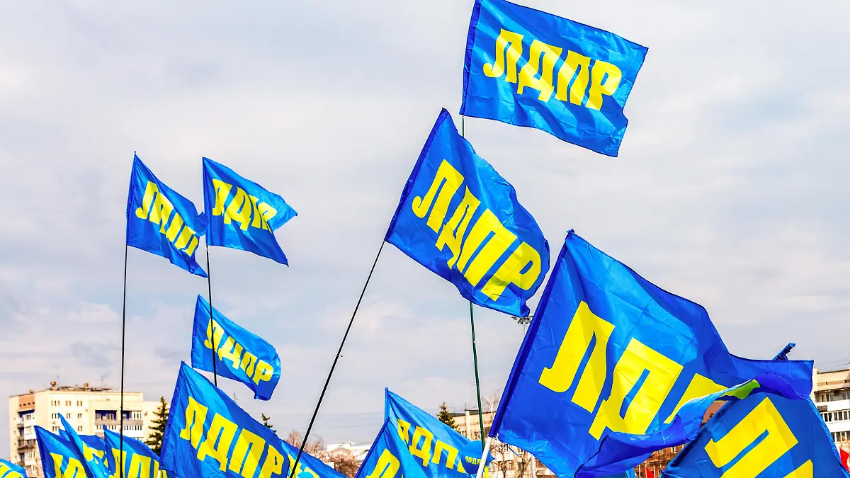 Samara, Russia - May 1, 2018: Flags of Liberal Democratic Party of Russia (LDPR) against the blue sky
