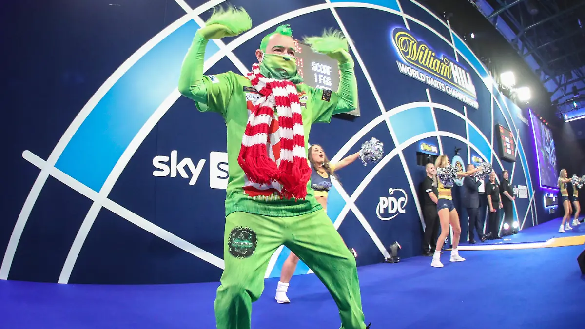 firo : 15.12.2020, Darts, Darts-WM 2021, Weltmeisterschaft in London, im Alexandra Palace, ALLY PALLY, PDC William Hill World Darts Championship 2021 Peter Wright , walk on , Witz , Humor , Highlight