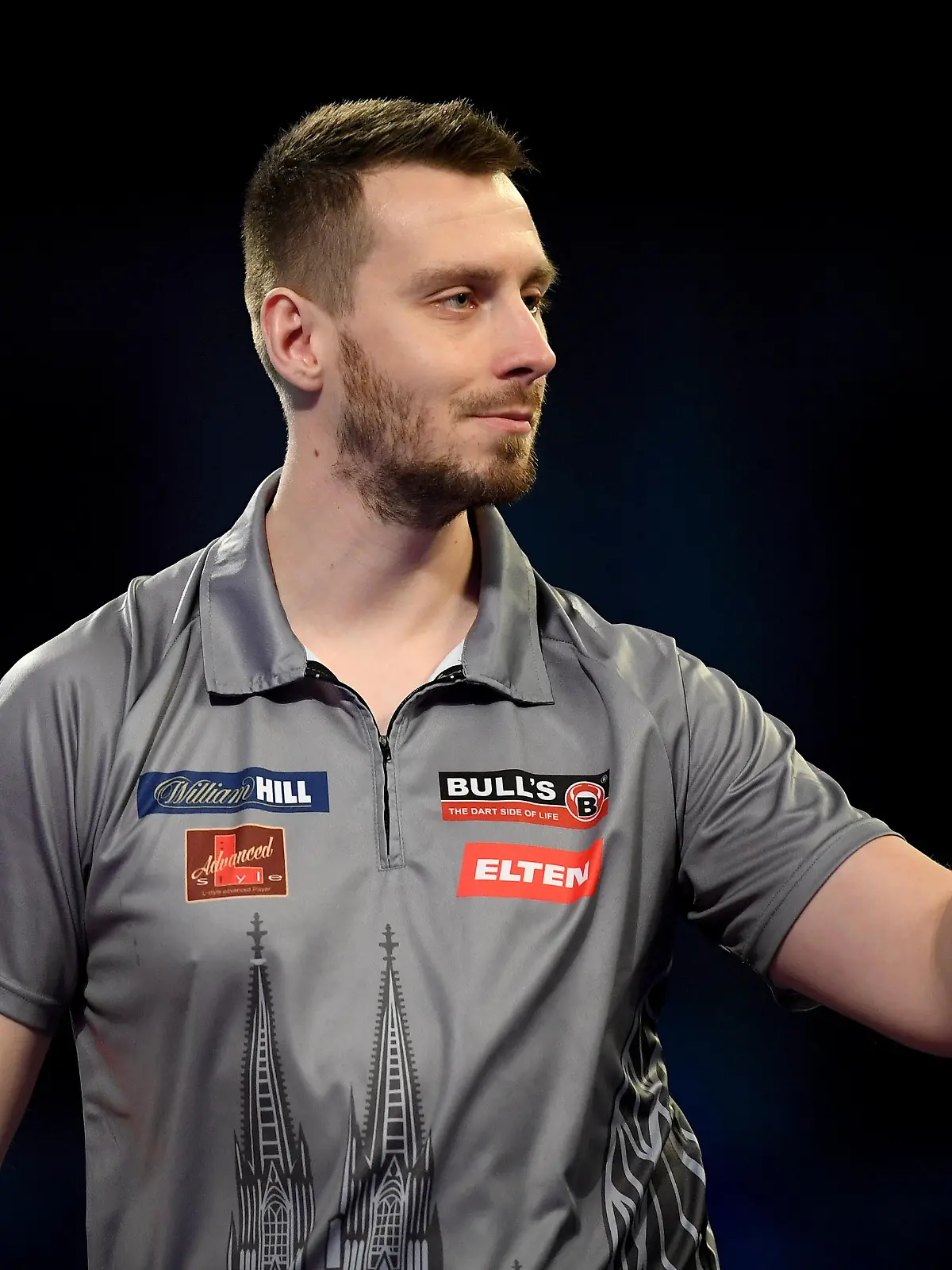 LONDON, ENGLAND - DECEMBER 19: Florian Hempel of Germany celebrates during Day Five of the 2021/22 PDC William Hill World Darts Championship at Alexandra Palace on December 19, 2021 in London, England. (Photo by Tom Dulat/Getty Images)