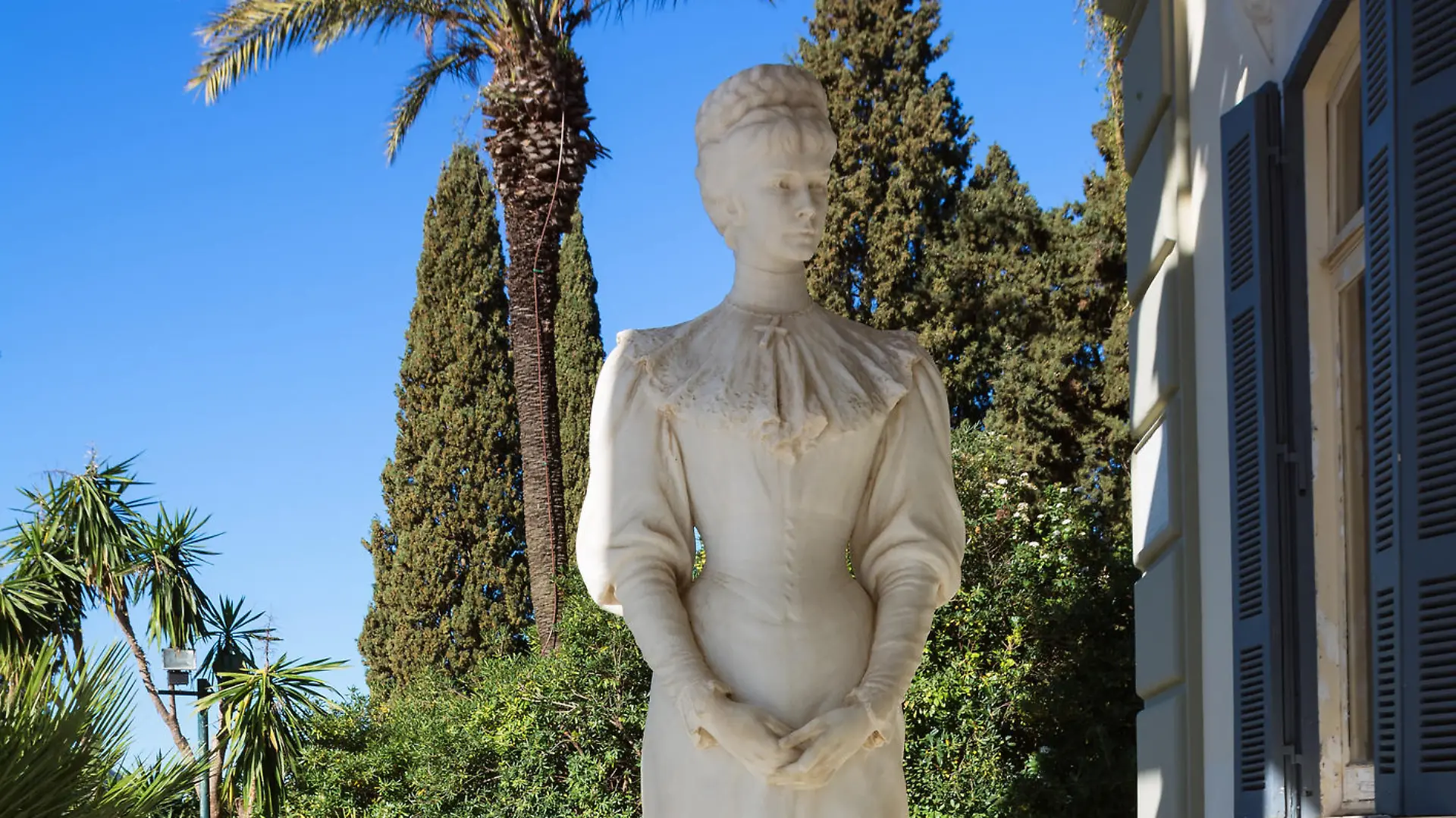 CORFU, GREECE - MARCH 4, 2017: Achilleion palace in Corfu Island, Greece. Statue of Empress of Austria Elisabeth of Bavaria, also known as Sisi.