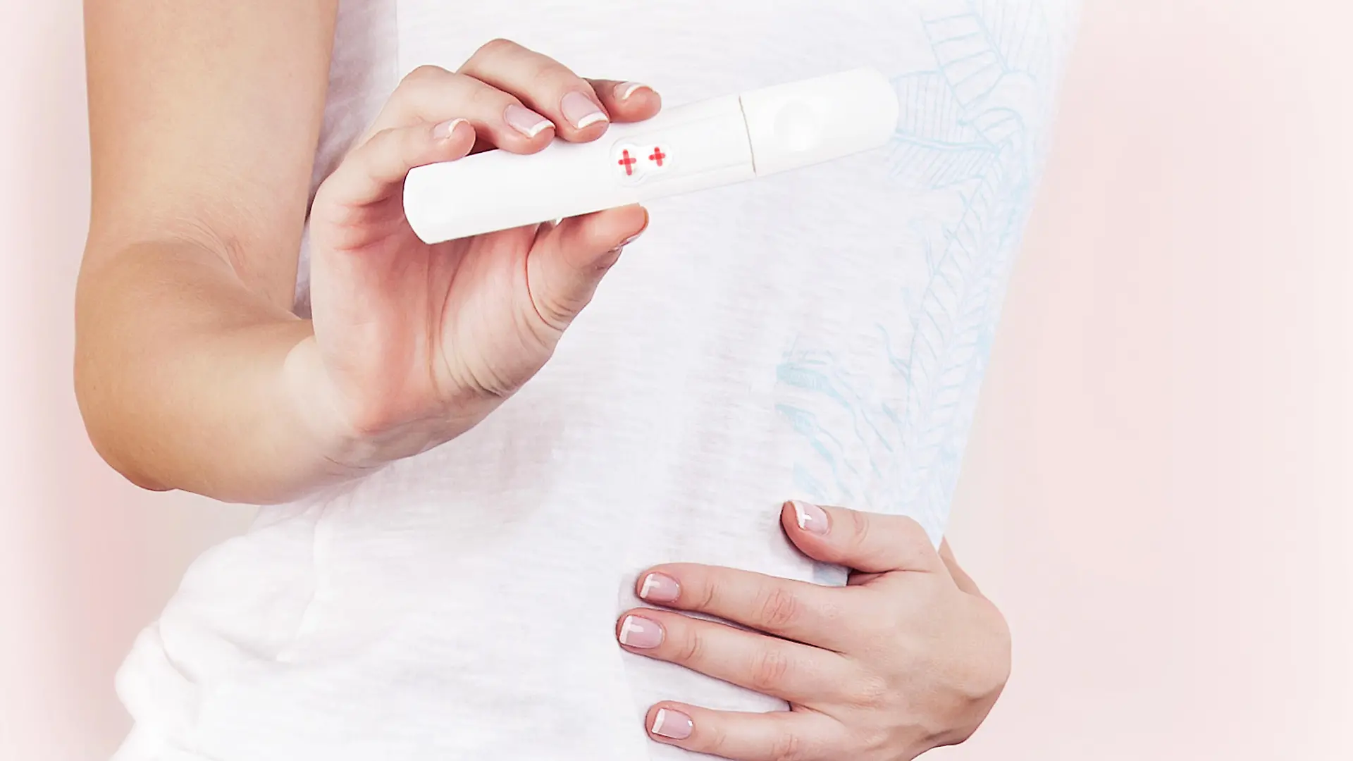 Positive pregnancy test result, closeup on pregnant belly, healthy mother touching tummy, female hand hold medical hormone test, isolated, new life and new family concept