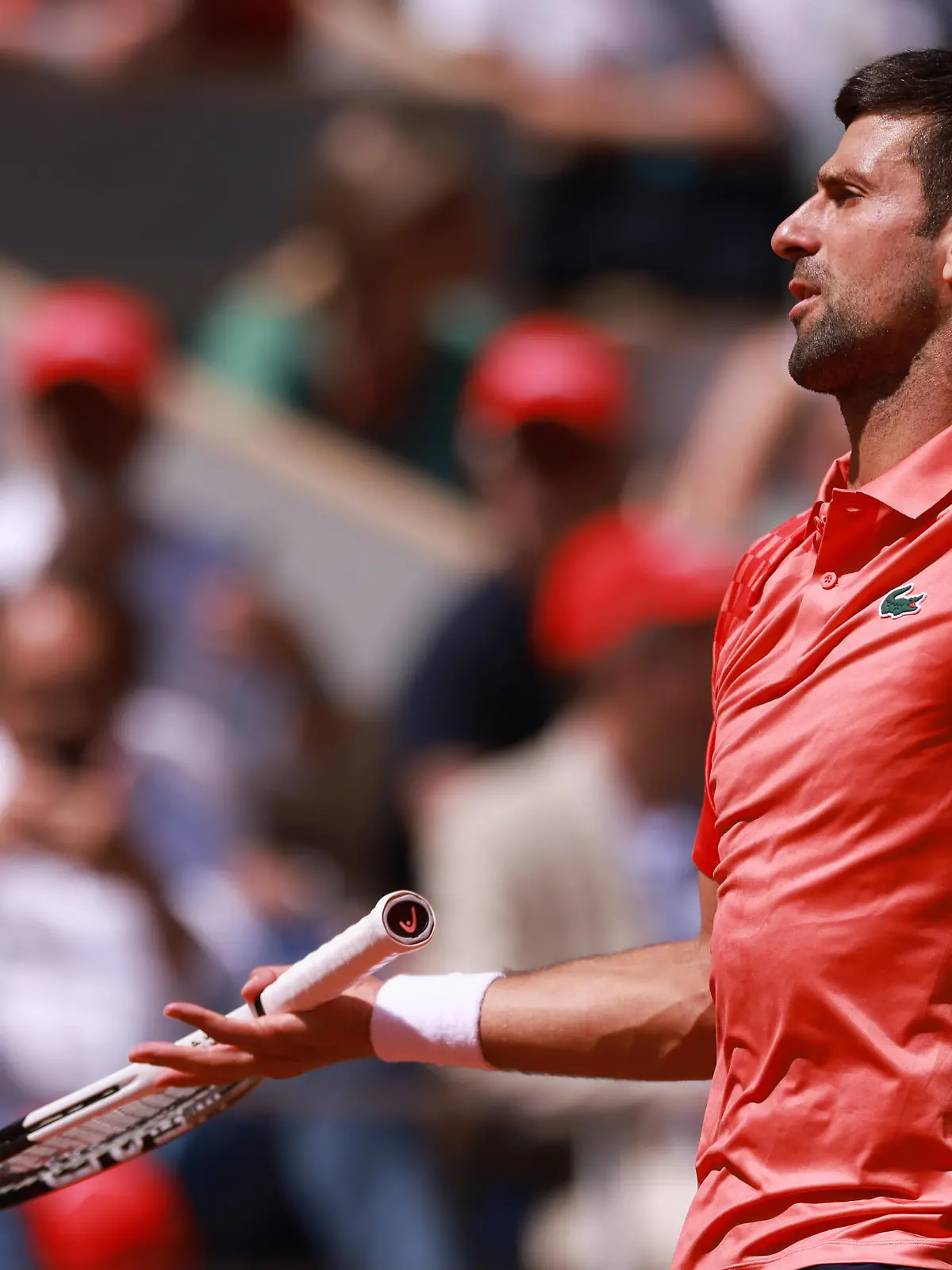 230530 -- PARIS, May 30, 2023 -- Novak Djokovic of Serbia reacts during the men s singles first round match between Novak Djokovic of Serbia and Aleksandar Kovacevic of the United States at the French Open tennis tournament at Roland Garros in Paris, France, on May 29, 2023.  SPFRANCE-PARIS-TENNIS-ROLAND GARROS-FRENCH OPEN-MEN S SINGLES GaoxJing PUBLICATIONxNOTxINxCHN