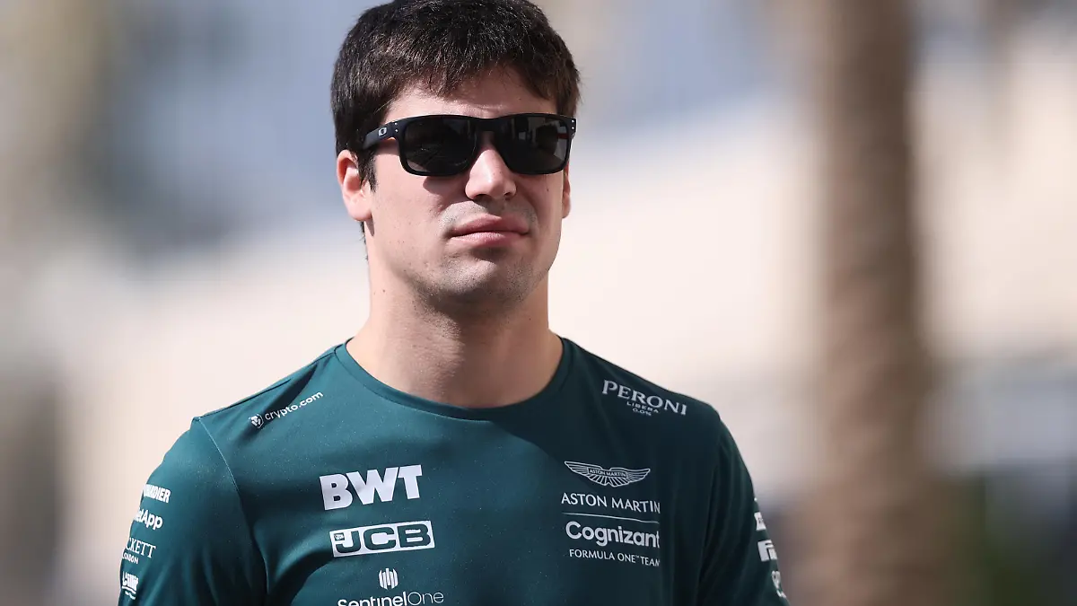 ABU DHABI, UNITED ARAB EMIRATES - DECEMBER 12: Lance Stroll of Canada and Aston Martin F1 Team walks in the Paddock before the F1 Grand Prix of Abu Dhabi at Yas Marina Circuit on December 12, 2021 in Abu Dhabi, United Arab Emirates. (Photo by Lars Baron/Getty Images)