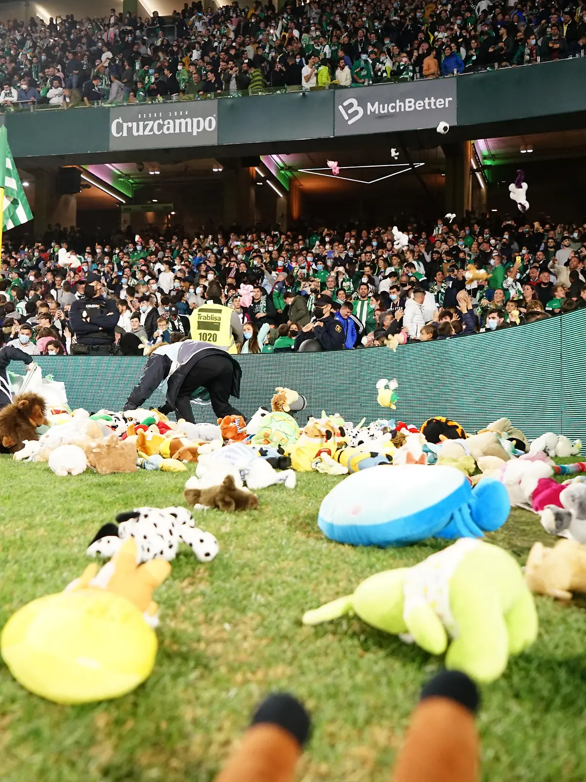December 12, 2021, Seville, Spain: Stuffed animals seen on the grass of Benito Villamarin Stadium in Seville. Real Betis organized a rain of stuffed animals during the half time of the La Liga Santander match between Real Betis and Real Sociedad. (Credit Image: © Francis Gonzalez/SOPA Images via ZUMA Press Wire