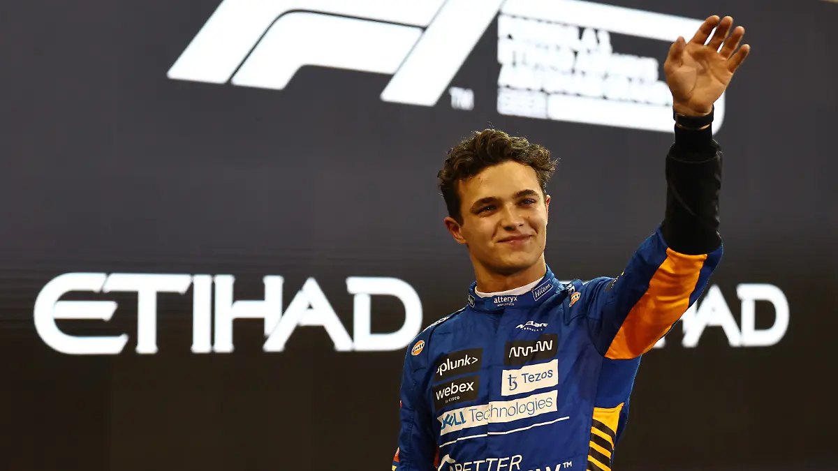 ABU DHABI, UNITED ARAB EMIRATES - DECEMBER 11: Third place qualifier Lando Norris of Great Britain and McLaren F1 celebrates in parc ferme during qualifying ahead of the F1 Grand Prix of Abu Dhabi at Yas Marina Circuit on December 11, 2021 in Abu Dhabi, United Arab Emirates. (Photo by Mark Thompson/Getty Images)