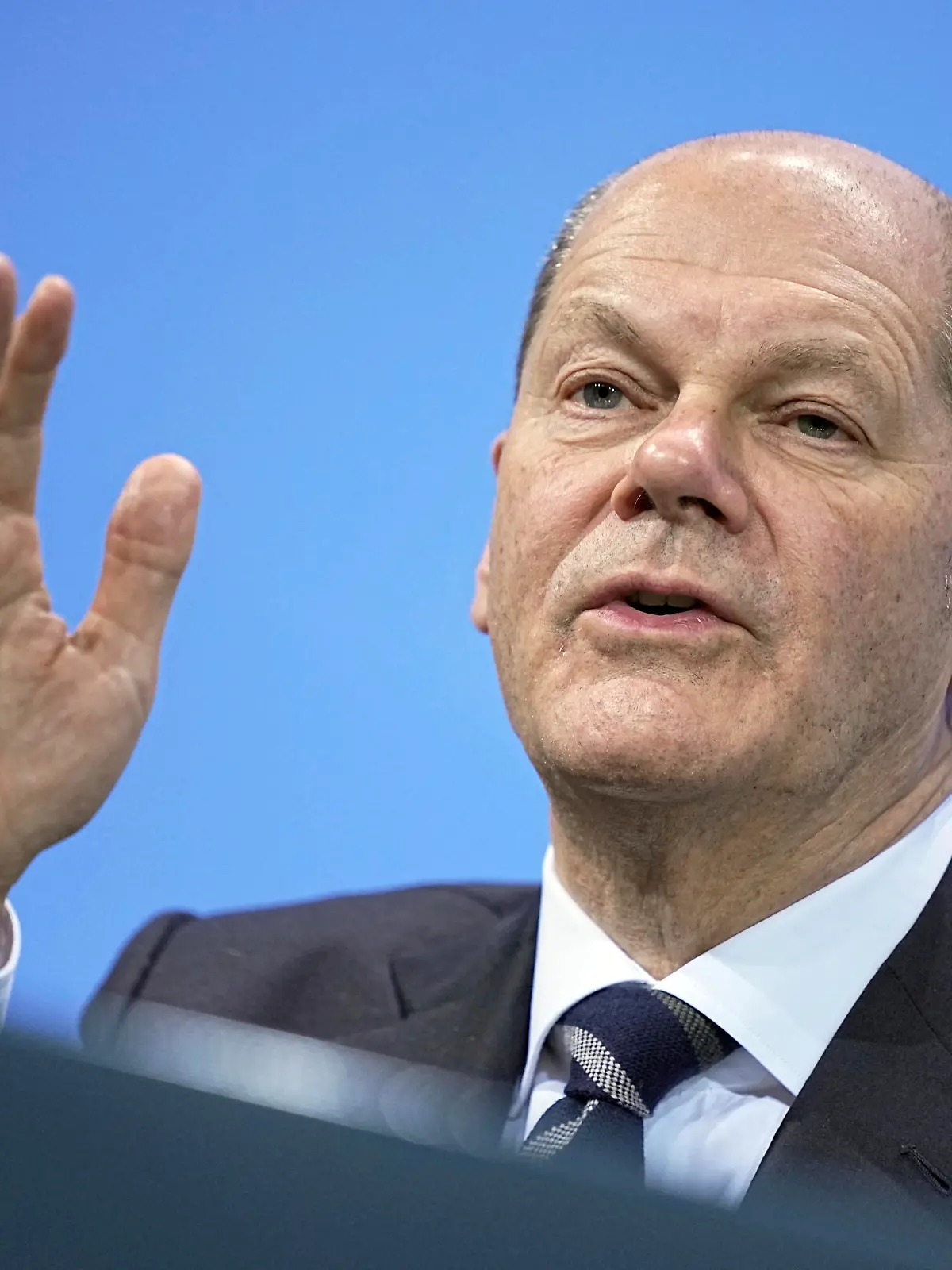 German Chancellor Olaf Scholz speaks at a press conference after the federal government's consultations with the state premiers in Berlin, Germany, Thursday Dec. 9, 2021. (Michael Kappeler/Pool via AP)