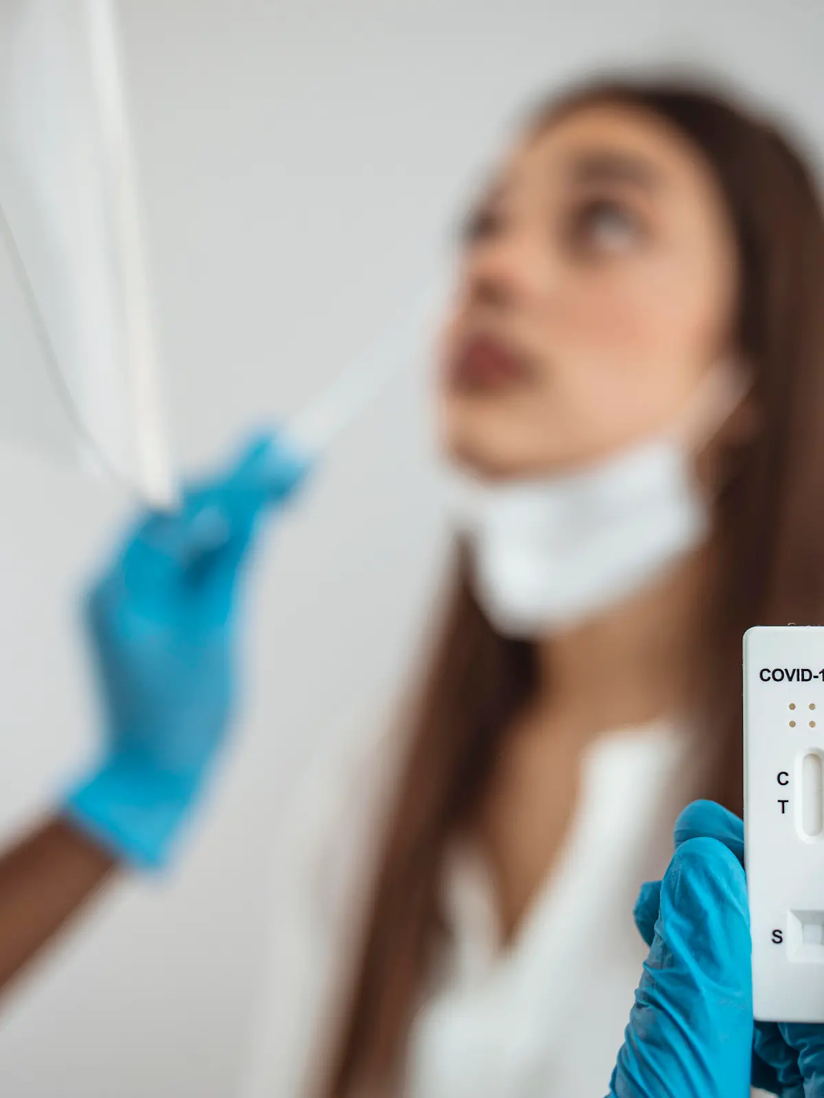 Cassette rapid test for COVID-19. Test result by using rapid test for COVID-19, quick fast antibody point of care testing. Lab performing rapid diagnostic test for antibodies to detect presence of antigens COVID-19 disease.