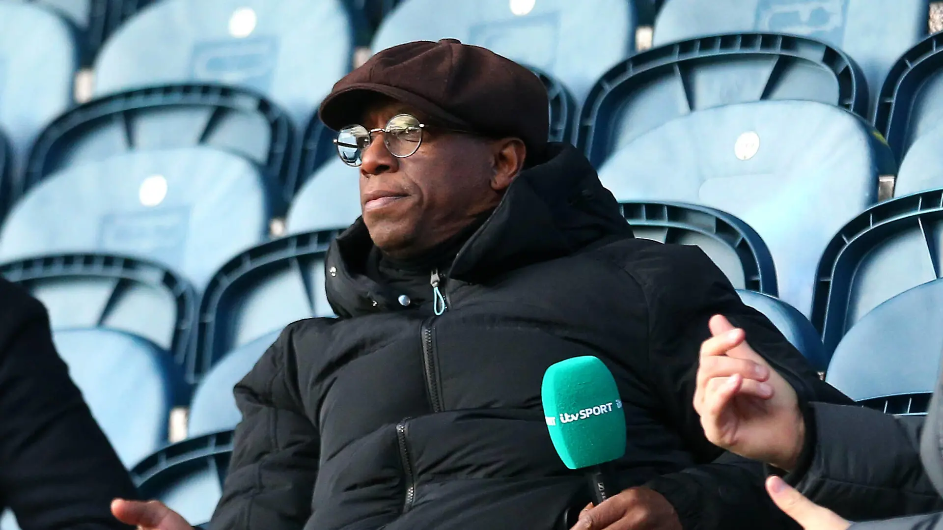 Rochdale v Plymouth Argyle - Emirates FA Cup - Second Round - Crown Oil Arena Former Arsenal player Ian Wright working for ITV in the stands during the Emirates FA Cup second round match at Crown Oil Arena, Rochdale. Picture date: Sunday December 5, 2021. EDITORIAL USE ONLY No use with unauthorised audio, video, data, fixture lists, club/league logos or live services. Online in-match use limited to 120 images, no video emulation. No use in betting, games or single club/league/player publications. PUBLICATIONxINxGERxSUIxAUTxONLY Copyright: xTimxMarklandx 64146081