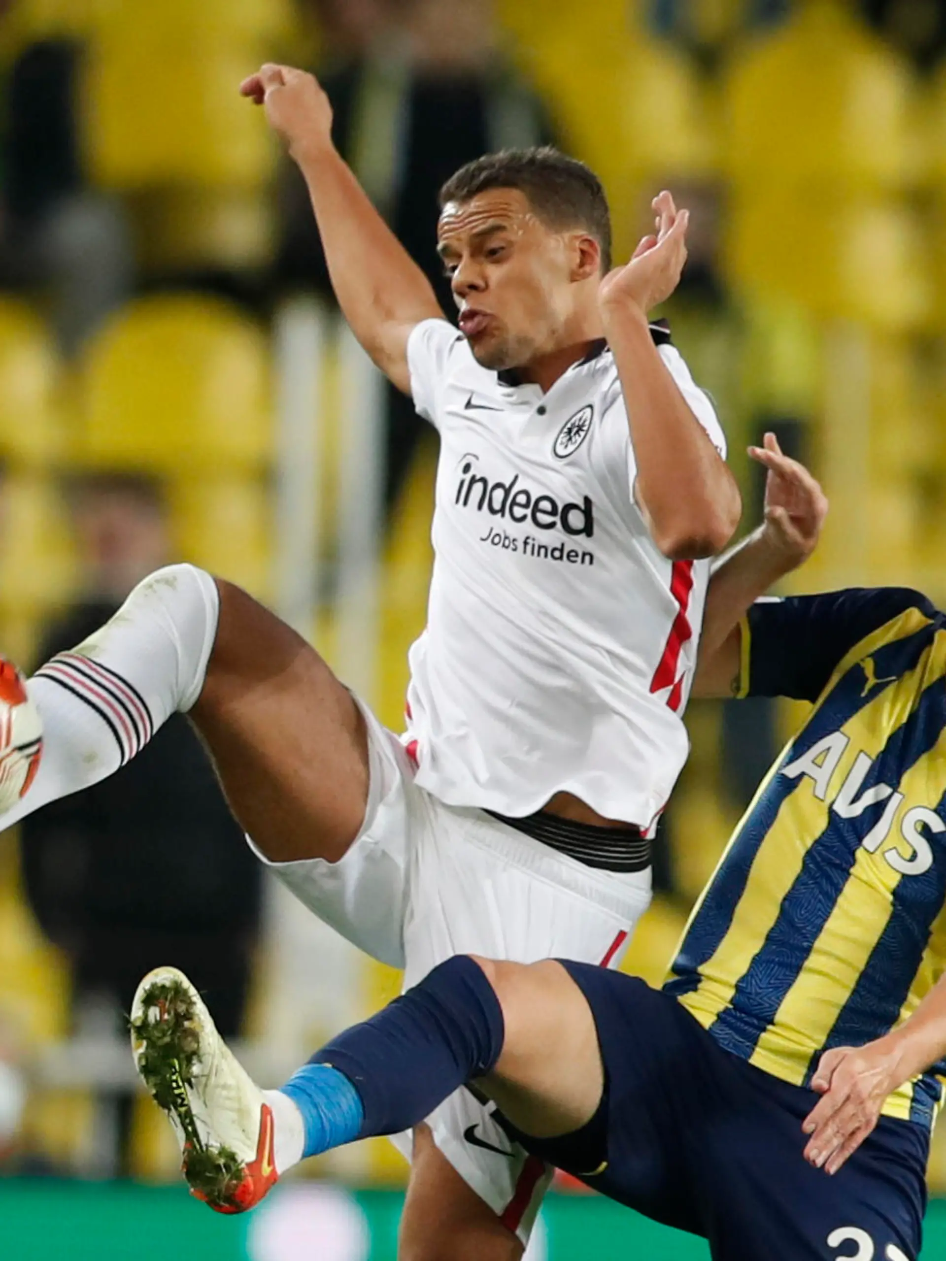 Soccer Football - Europa League - Group D - Fenerbahce v Eintracht Frankfurt - Sukru Saracoglu Stadium, Istanbul, Turkey - December 9, 2021 Eintracht Frankfurt's Timothy Chandler in action with Fenerbahce's Filip Novak REUTERS/Murad Sezer