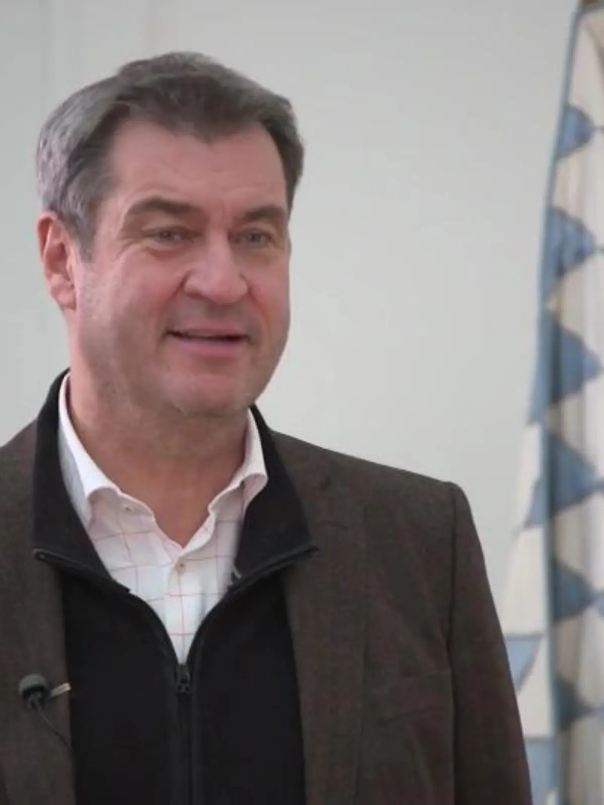 Bild zu: "Söder verzeiht Scholz Schlumpf-Grinsen"