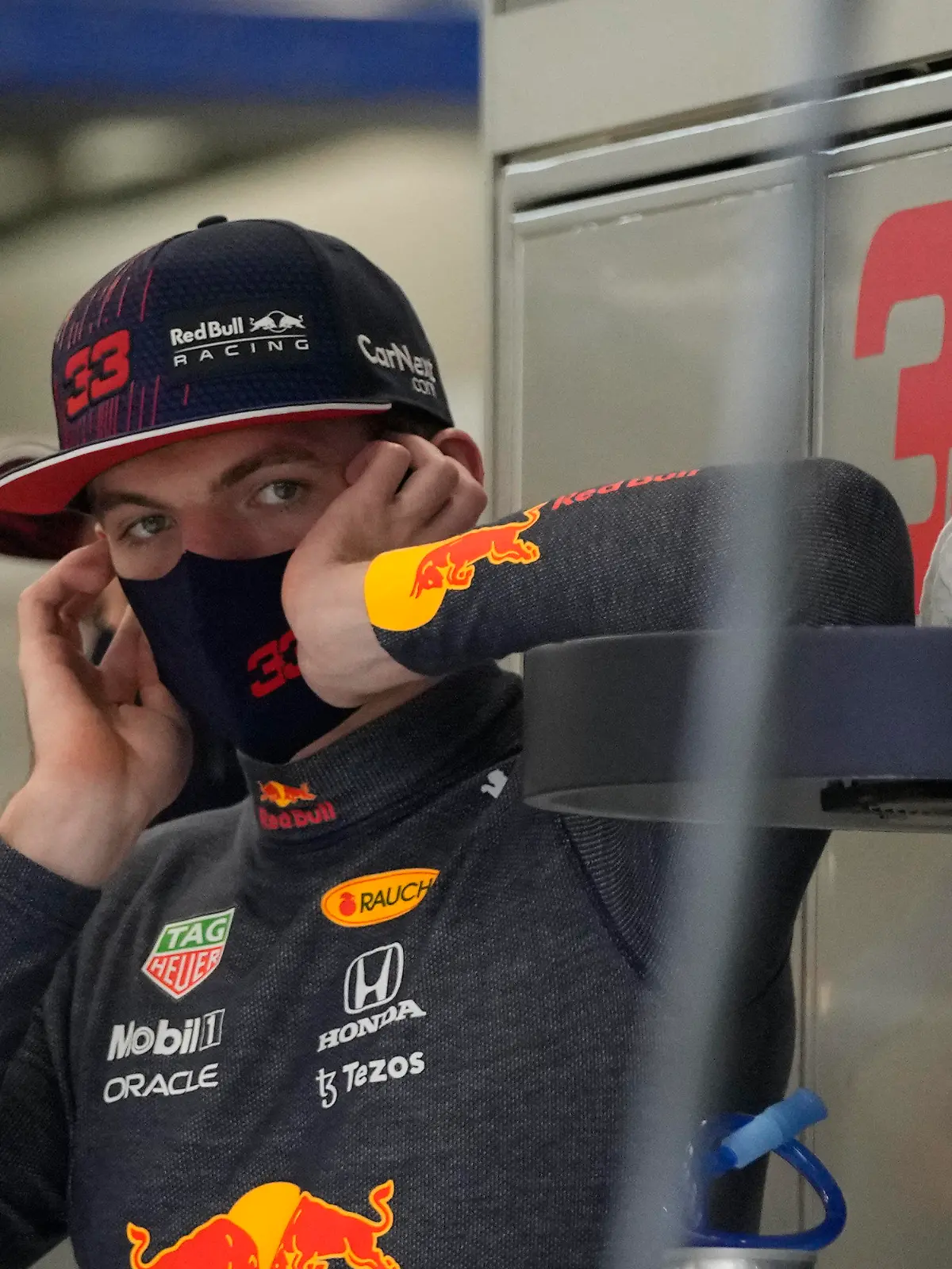 Red Bull driver Max Verstappen of the Netherlands stands during practice session for the Saudi Arabian Grand Prix in Jiddah, Friday, Dec. 3, 2021. (AP Photo/Hassan Ammar)