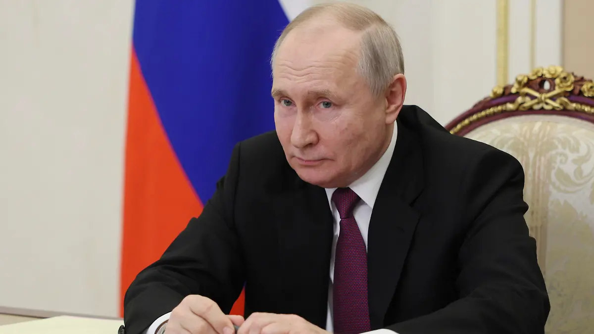 Russian President Vladimir Putin attends a meeting with families awarded Orders of Parental Glory via teleconference call at the Kremlin in Moscow, Russia, Thursday, June 1, 2023. (Gavriil Grigorov, Sputnik, Kremlin Pool Photo via AP)
