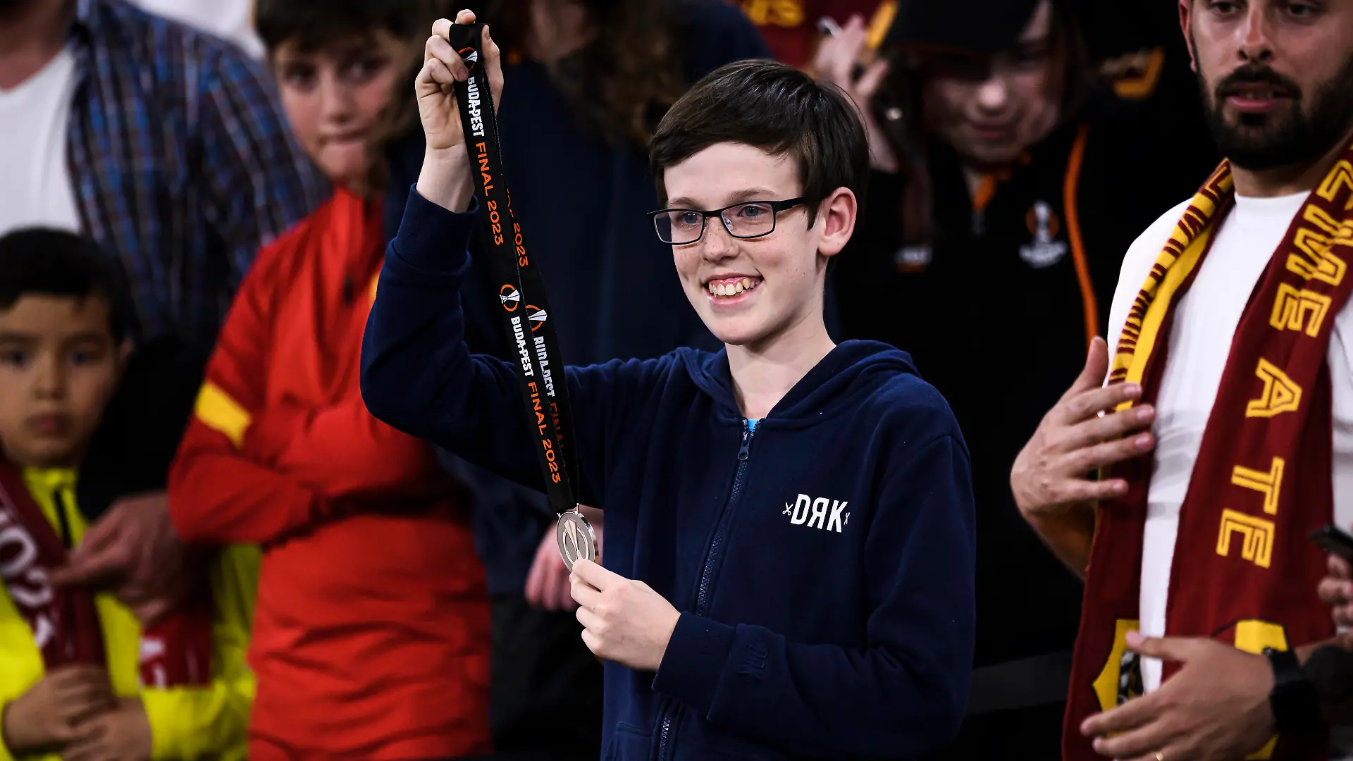 Sevilla FC v AS Roma - UEFA Europa League A young fan holds the medal gifted by Jose Mourinho, head coach of AS Roma, during the UEFA Europa League final football match between Sevilla FC and AS Roma. Budapest Hungary Copyright: xNicolòxCampox