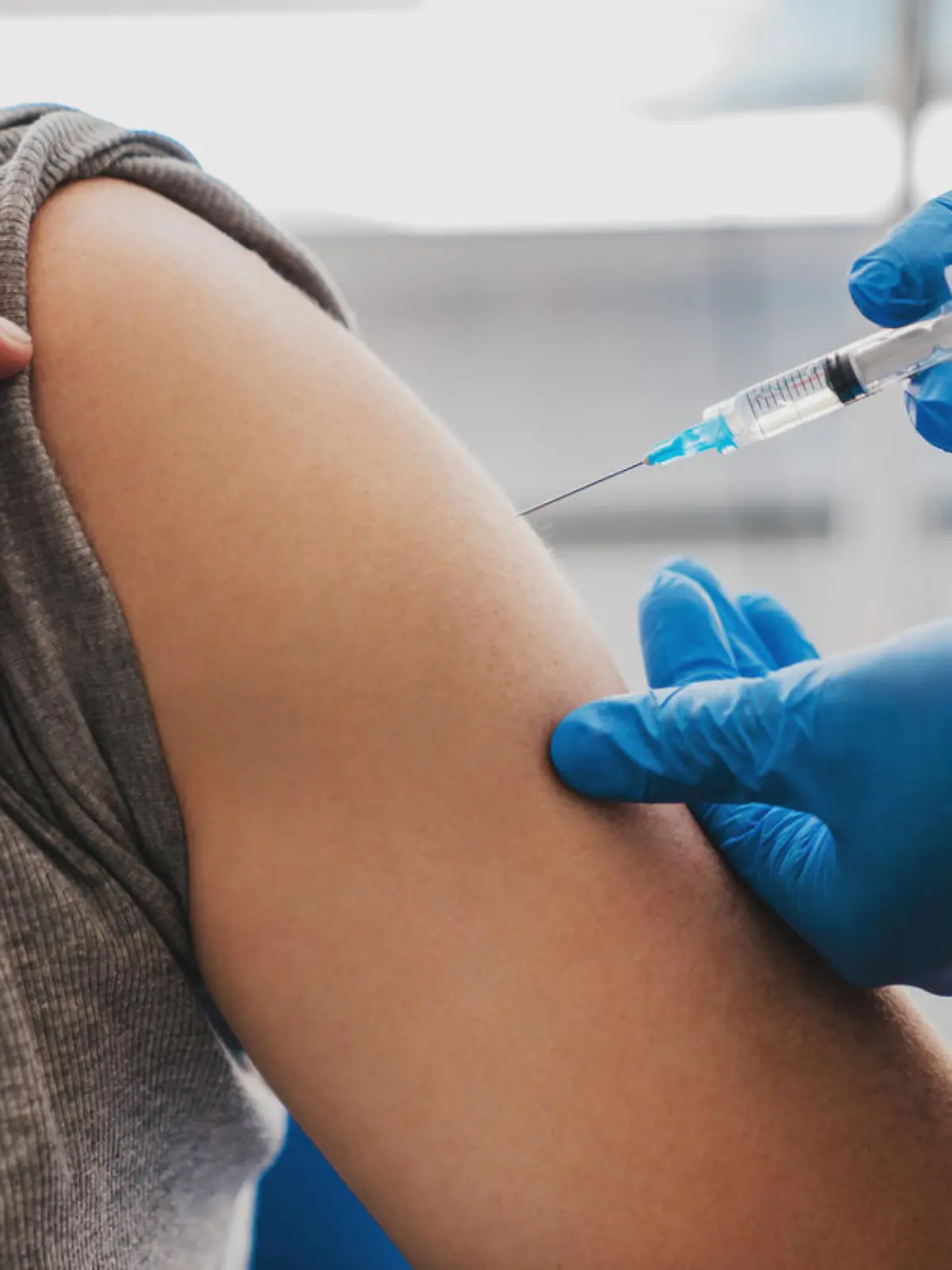 Vaccination of senior person in hospital