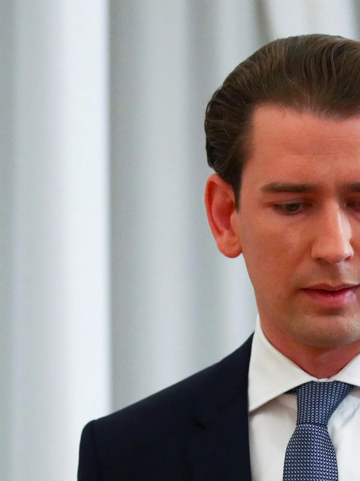 FILE PHOTO: Austria's Chancellor Sebastian Kurz leaves after making a statement at the Chancellery in Vienna, Austria October 8, 2021. REUTERS/Lisi Niesner/File Photo