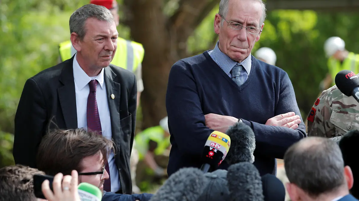 Former Royal British army officer Richard Lee, 68, answer journalists' questions together with Mike Hill, member of the lower house of parliament at the site where British military police search for remains of Lee's two-year-old girl Katrice who went missing 36 years ago in Germany where her father was stationed at the time, near the river of Alme in Paderborn, Germany, May 3, 2018.  REUTERS/Wolfgang Rattay