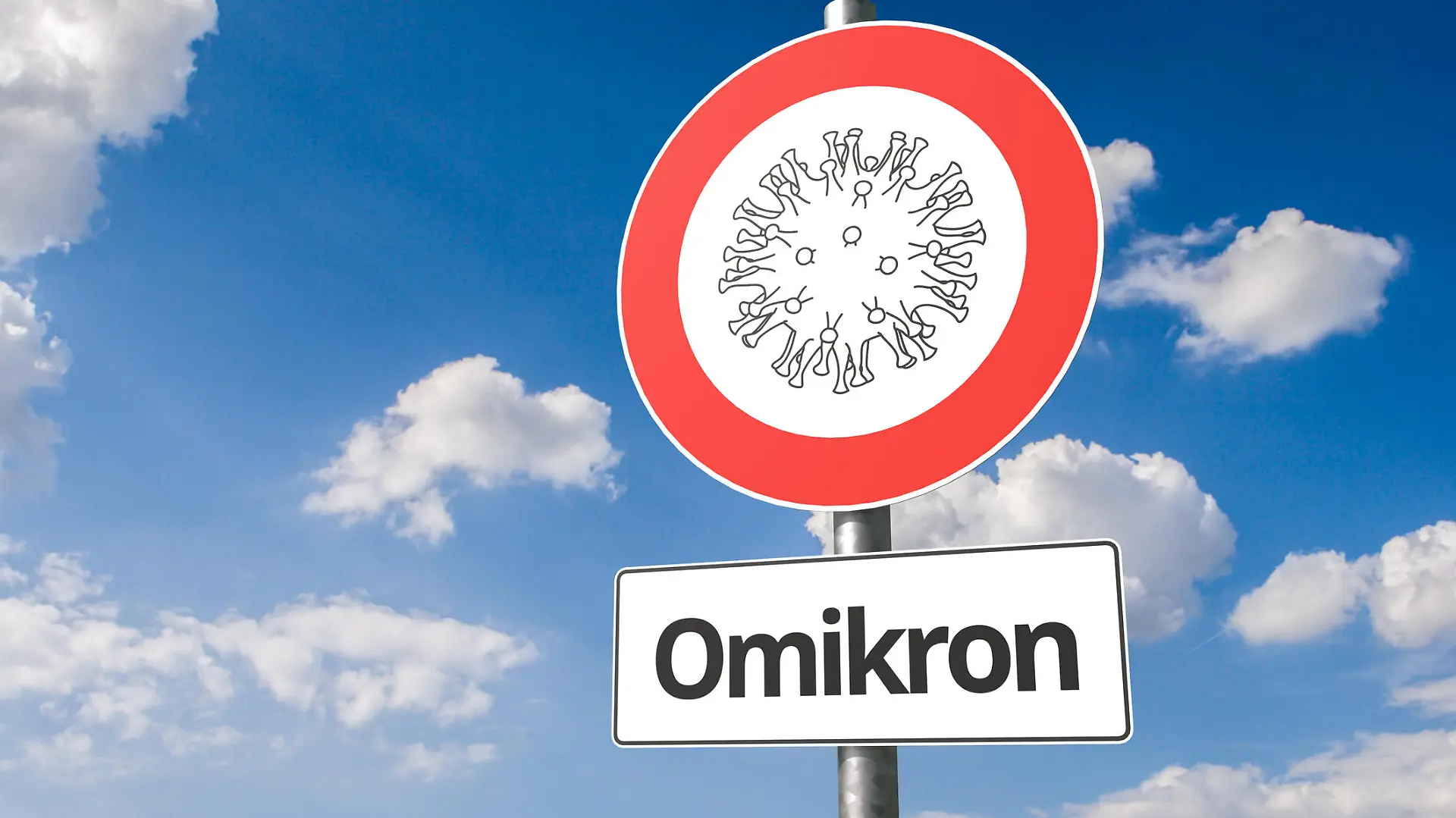 New mutation of corona virus named "omikron" B.1.1.529: Corona virus - Schematic image of a virus on a no entry sign with the the text "Omikron" below.
