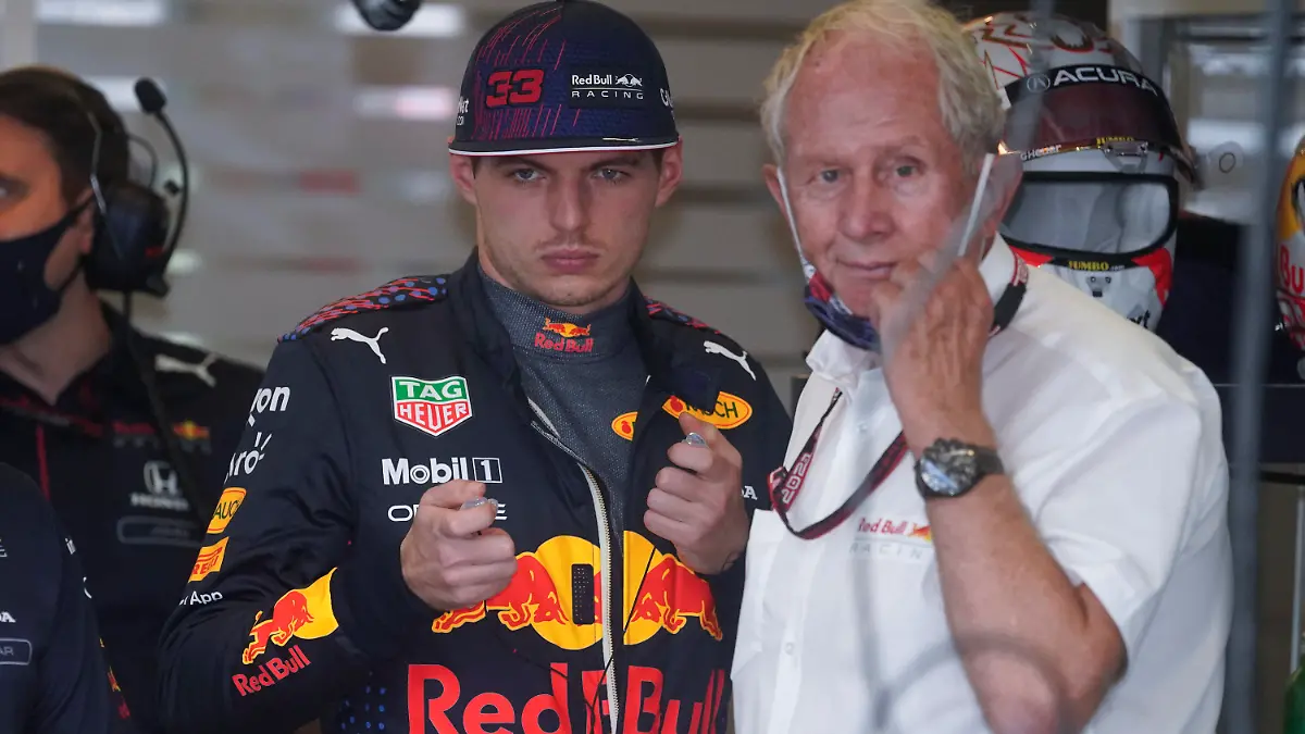 Red Bull driver Max Verstappen, of the Netherlands, center, talks with Helmut Marko, right, before a practice session for the F1 US Grand Prix auto race at the Circuit of the Americas, Friday, Oct. 22, 2021, in Austin, Texas. (AP Photo/Darron Cummings)