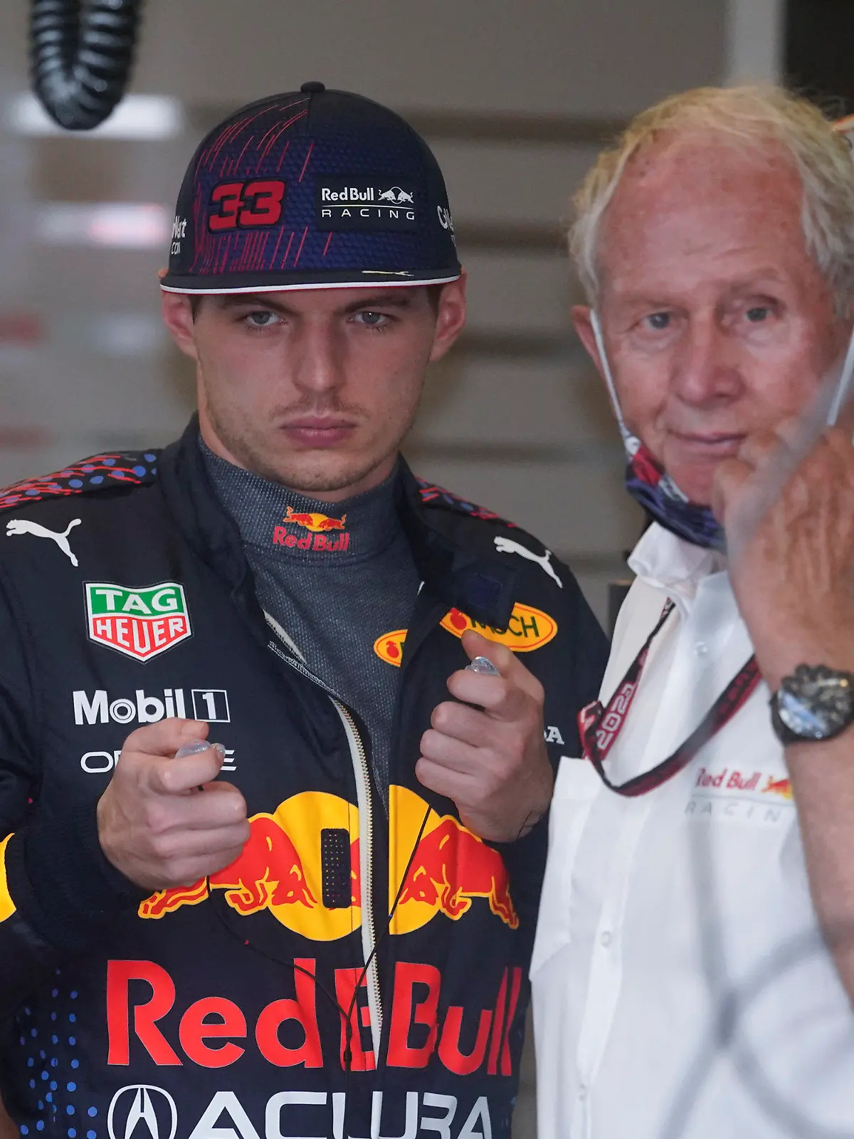 Red Bull driver Max Verstappen, of the Netherlands, center, talks with Helmut Marko, right, before a practice session for the F1 US Grand Prix auto race at the Circuit of the Americas, Friday, Oct. 22, 2021, in Austin, Texas. (AP Photo/Darron Cummings)