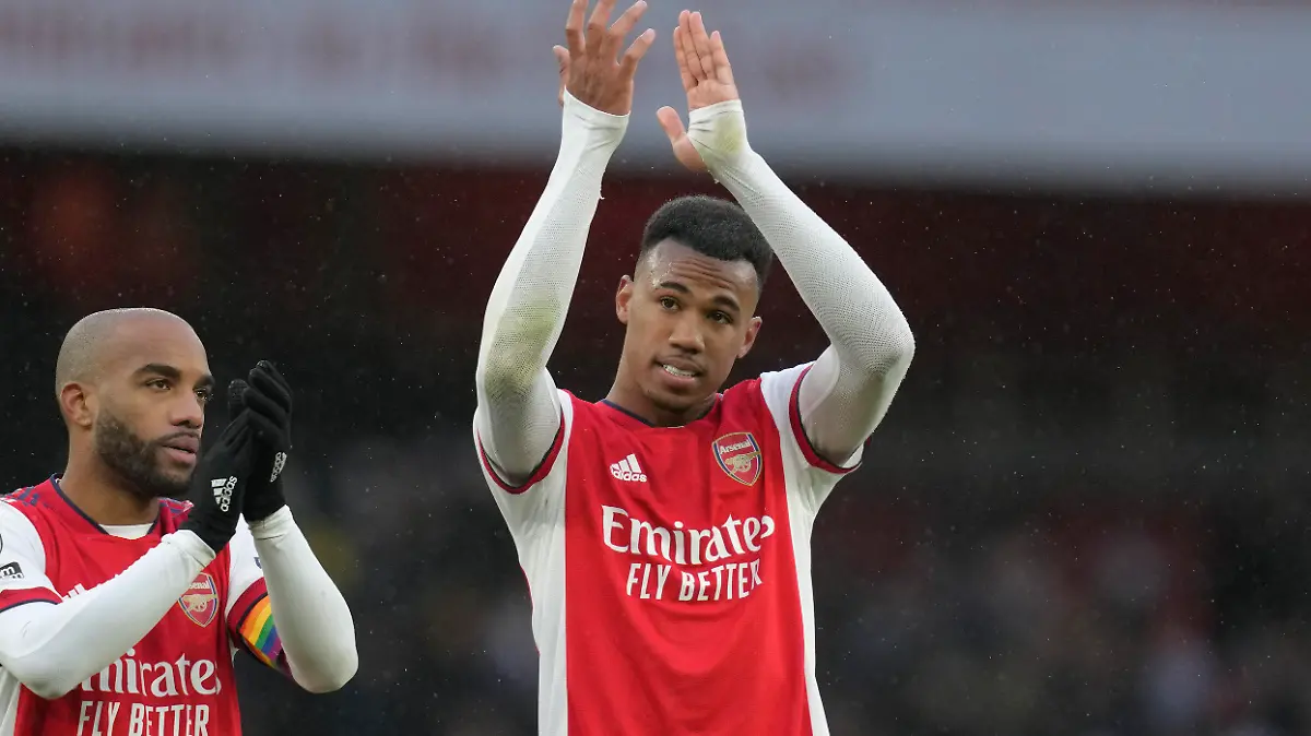 Arsenal's Gabriel, right, and Arsenal's Alexandre Lacazette celebrate at the end of the English Premier League soccer match between Arsenal and Newcastle United at Emirates stadium in London, Saturday, Nov. 27, 2021. (AP Photo/Kirsty Wigglesworth)