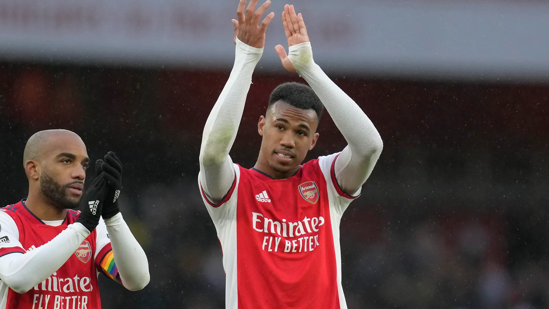 Arsenal's Gabriel, right, and Arsenal's Alexandre Lacazette celebrate at the end of the English Premier League soccer match between Arsenal and Newcastle United at Emirates stadium in London, Saturday, Nov. 27, 2021. (AP Photo/Kirsty Wigglesworth)