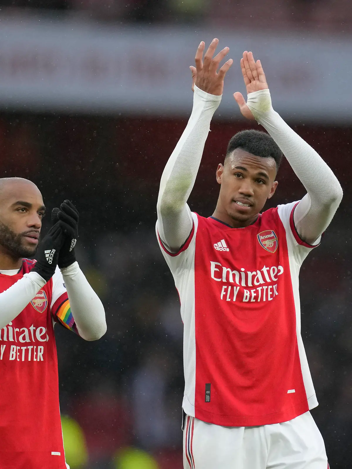 Arsenal's Gabriel, right, and Arsenal's Alexandre Lacazette celebrate at the end of the English Premier League soccer match between Arsenal and Newcastle United at Emirates stadium in London, Saturday, Nov. 27, 2021. (AP Photo/Kirsty Wigglesworth)