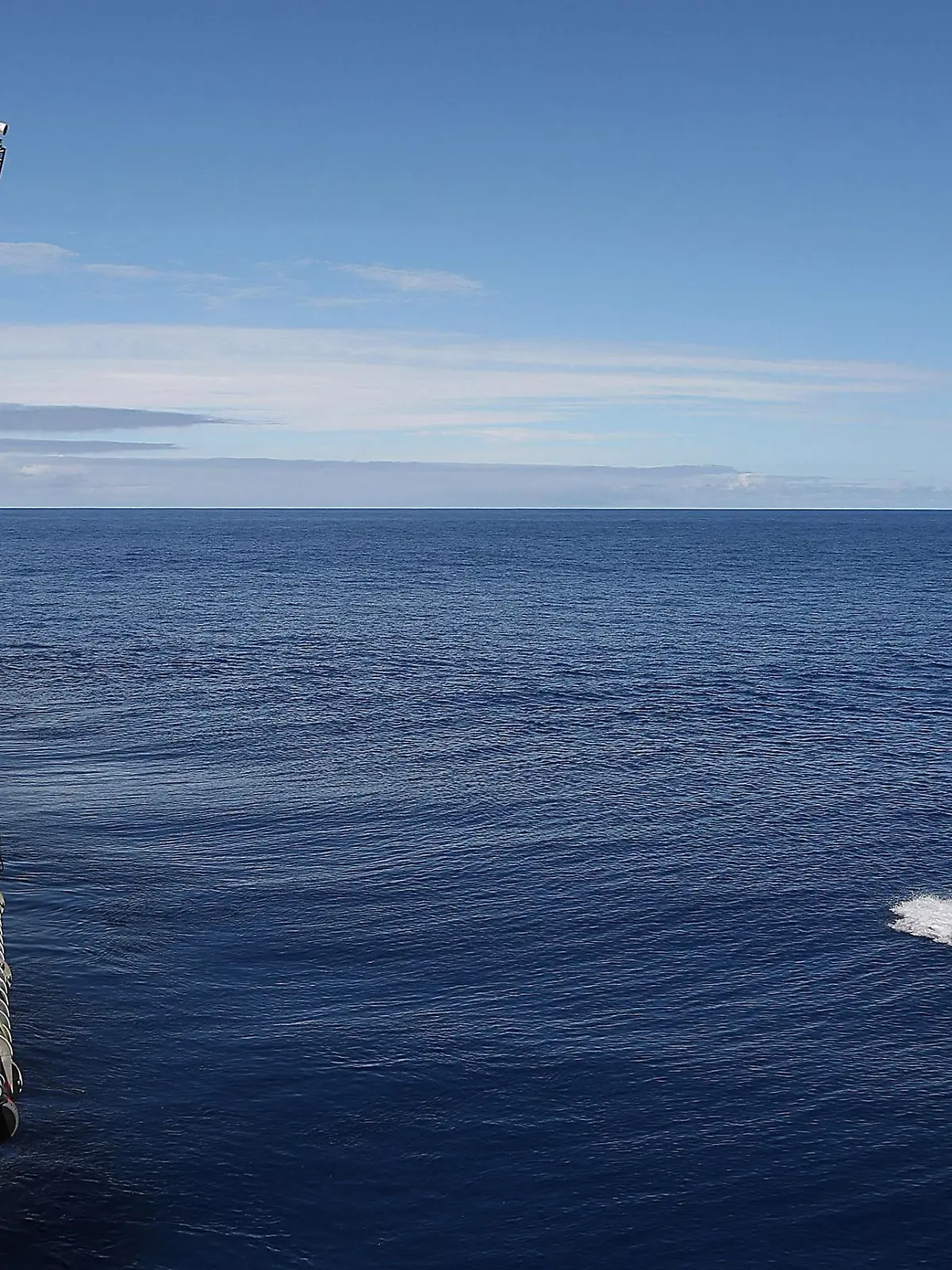 Crew members are seen aboard a fast response craft (R) from the Australian Defence Vessel Ocean Shield (L) as they continue to search for debris of the missing Malaysian Airlines flight MH370 in the southern Indian Ocean, in this picture released by the Australian Defence Force on April 8, 2014. Australian officials said on April 9, 2014 that two new "ping" signals had been detected in the search for missing Malaysia Airlines Flight MH370, which was carrying 227 passengers and 12 crew. Angus Houston, head of the Australian agency coordinating the search, said one ping was detected on the afternoon of April 8 and lasted five minutes, 25 seconds, while a second was picked up that night and lasted seven minutes.  REUTERS/Australian Defence Force/Handout via Reuters  (MID-SEA - Tags: MILITARY TRANSPORT DISASTER MARITIME) ATTENTION EDITORS – THIS PICTURE WAS PROVIDED BY A THIRD PARTY. REUTERS IS UNABLE TO INDEPENDENTLY VERIFY THE AUTHENTICITY, CONTENT, LOCATION OR DATE OF THIS IMAGE. NO SALES. NO ARCHIVES. FOR EDITORIAL USE ONLY. NOT FOR SALE FOR MARKETING OR ADVERTISING CAMPAIGNS. THIS PICTURE IS DISTRIBUTED EXACTLY AS RECEIVED BY REUTERS, AS A SERVICE TO CLIENTS