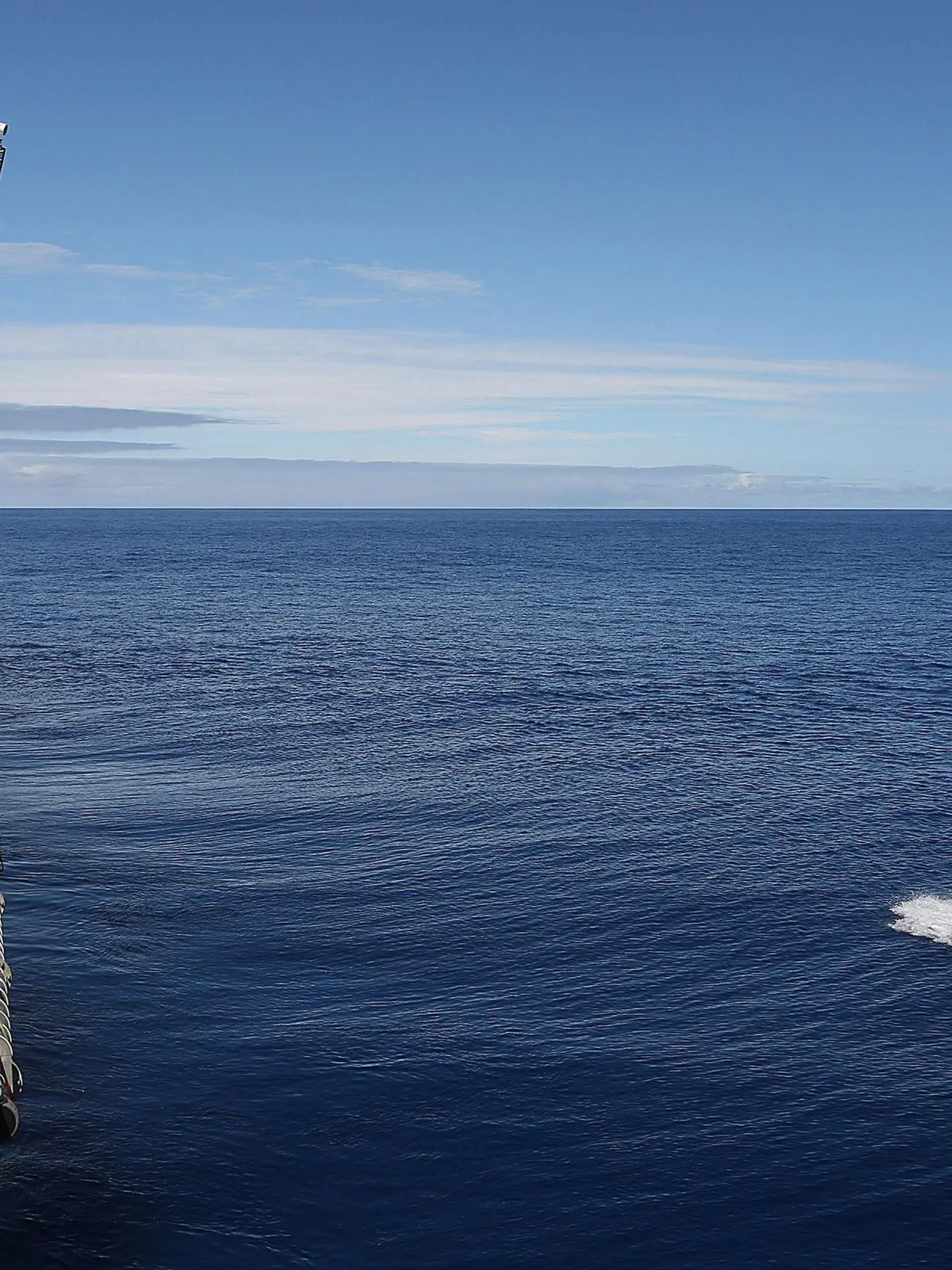 Crew members are seen aboard a fast response craft (R) from the Australian Defence Vessel Ocean Shield (L) as they continue to search for debris of the missing Malaysian Airlines flight MH370 in the southern Indian Ocean, in this picture released by the Australian Defence Force on April 8, 2014. Australian officials said on April 9, 2014 that two new "ping" signals had been detected in the search for missing Malaysia Airlines Flight MH370, which was carrying 227 passengers and 12 crew. Angus Houston, head of the Australian agency coordinating the search, said one ping was detected on the afternoon of April 8 and lasted five minutes, 25 seconds, while a second was picked up that night and lasted seven minutes.  REUTERS/Australian Defence Force/Handout via Reuters  (MID-SEA - Tags: MILITARY TRANSPORT DISASTER MARITIME) ATTENTION EDITORS – THIS PICTURE WAS PROVIDED BY A THIRD PARTY. REUTERS IS UNABLE TO INDEPENDENTLY VERIFY THE AUTHENTICITY, CONTENT, LOCATION OR DATE OF THIS IMAGE. NO SALES. NO ARCHIVES. FOR EDITORIAL USE ONLY. NOT FOR SALE FOR MARKETING OR ADVERTISING CAMPAIGNS. THIS PICTURE IS DISTRIBUTED EXACTLY AS RECEIVED BY REUTERS, AS A SERVICE TO CLIENTS