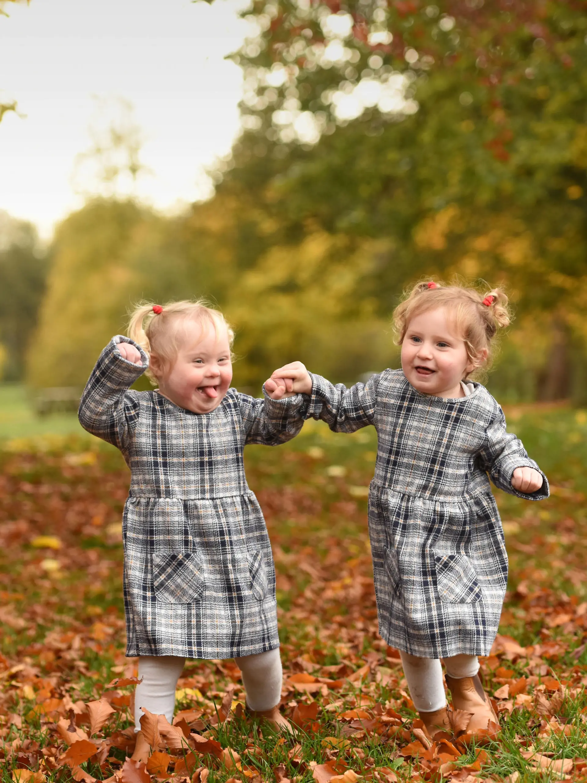 WILLIAM LAILEY / CATERS NEWS (PICTURED L-R Freya and Caitlyn together) A little girl who was born with Down Syndrome has taken her first steps thanks to her twin sister. Laura Guilliatt, 32, from Gainsborough, Lincs, gave birth to her twin girls, Freya and Caitlyn, now two, on 29 September 2019 after five years of struggling to conceive and deciding to opt for IVF. After an emergency C-section at 35 weeks pregnant, Freya was born with Down Syndrome and Caitlyn was not, which is thought to be 14 in one million chance with non-identical twins. As the twins got older, Caitlyn began crawling and walking a few months before her twin sister and would constantly encourage and help her to progress. SEE CATERS COPY