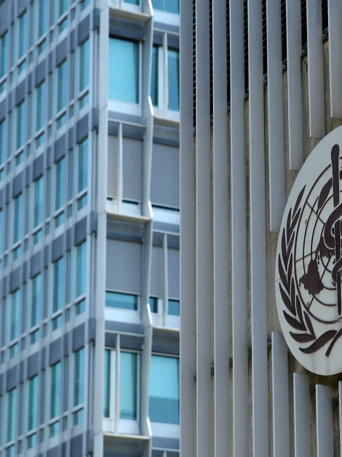 FILE PHOTO: A logo is pictured on the headquarters of the World Health Orgnaization (WHO) in Geneva, Switzerland, June 25, 2020. REUTERS/Denis Balibouse/File Photo