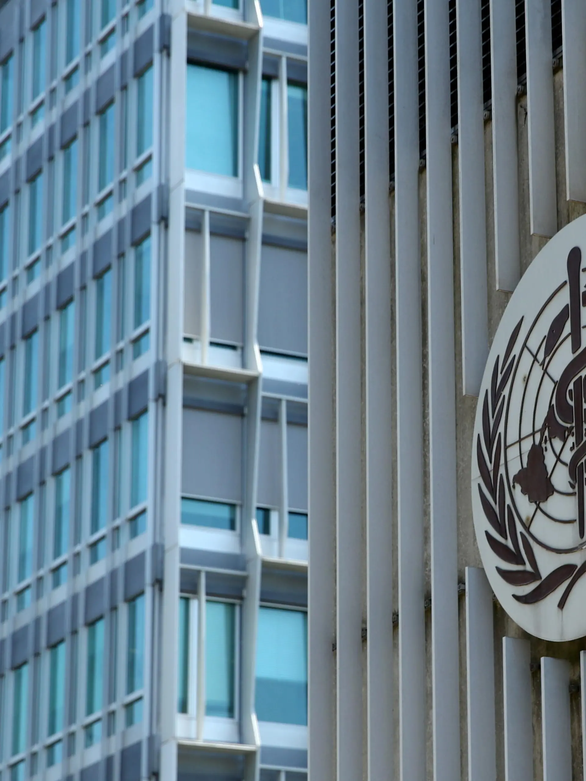 FILE PHOTO: A logo is pictured on the headquarters of the World Health Orgnaization (WHO) in Geneva, Switzerland, June 25, 2020. REUTERS/Denis Balibouse/File Photo