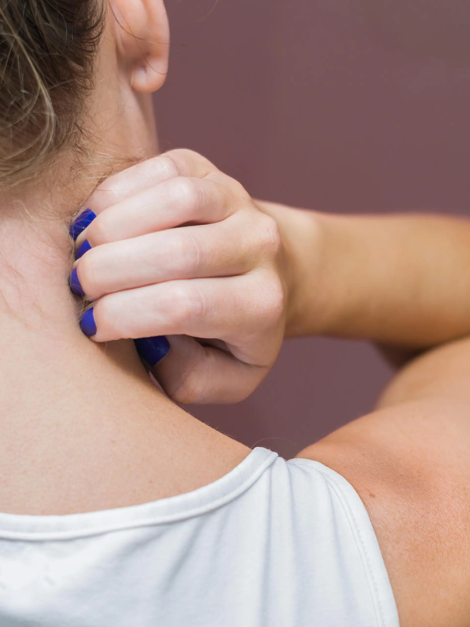Great concept of allergy and skin diseases, young woman scratching herself.