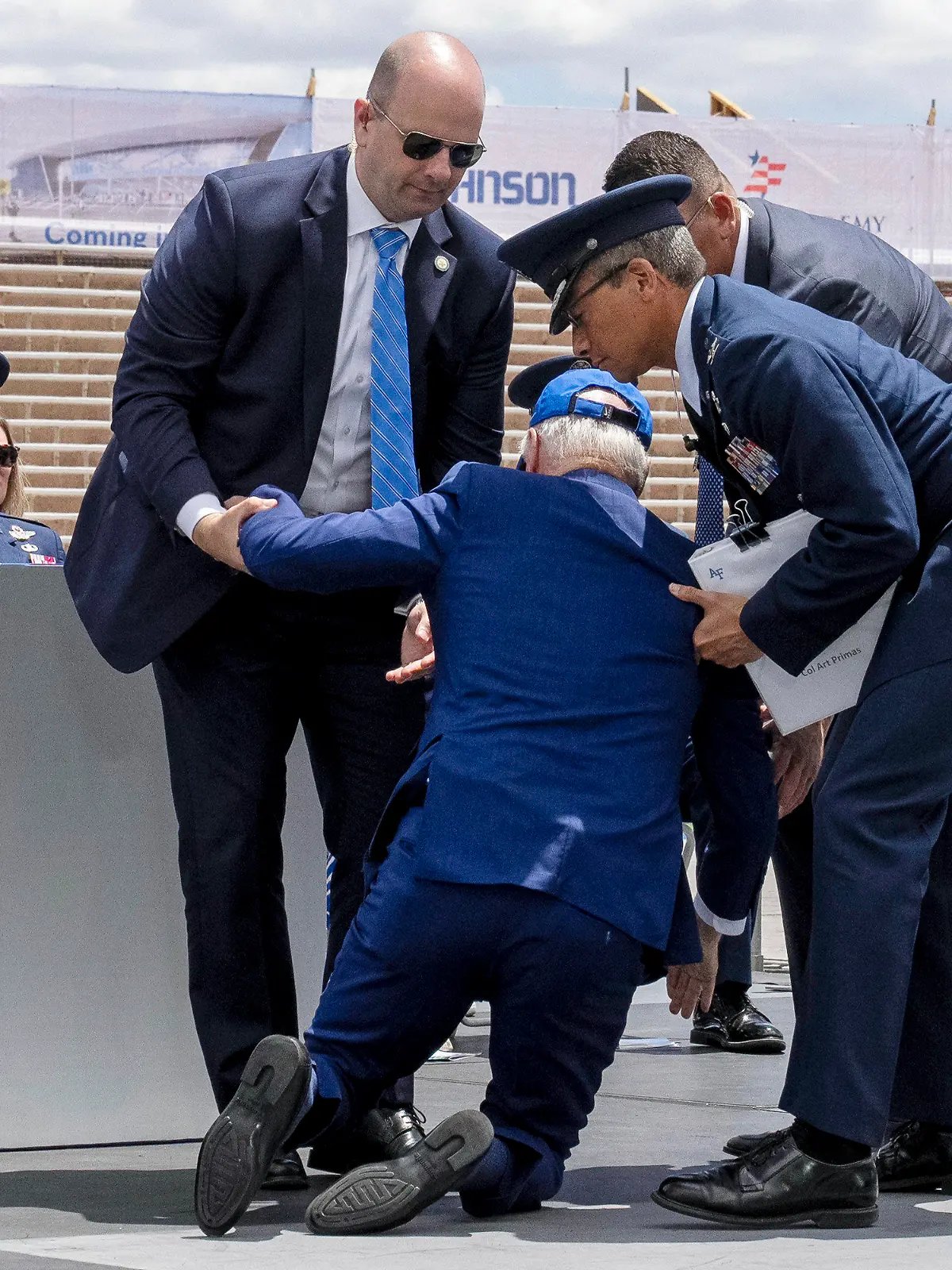 President Joe Biden falls on stage during the 2023 United States Air Force Academy Graduation Ceremony at Falcon Stadium, Thursday, June 1, 2023, at the United States Air Force Academy in Colorado Springs, Colo. (AP Photo/Andrew Harnik)