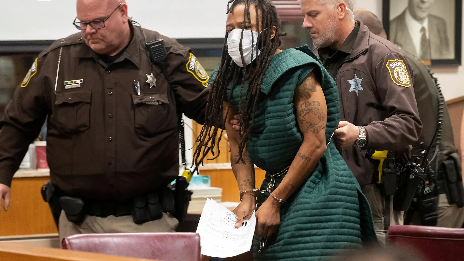 Darrell Brooks, charged with killing five people and injuring nearly 50 after plowing through a Christmas parade with his sport utility vehicle on November 21, appears in Waukesha County Court in Waukesha, Wisconsin, U.S. November 23, 2021. Mark Hoffman/Pool via REUTERS