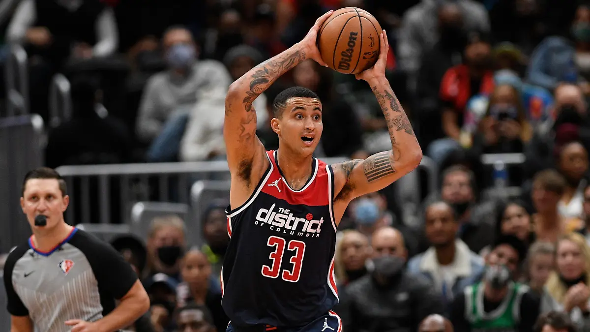 Washington Wizards forward Kyle Kuzma (33) in action during second half of an NBA basketball game against the Boston Celtics, Saturday, Oct. 30, 2021, in Washington. The Wizards won 115-112 in double overtime. (AP Photo/Nick Wass)