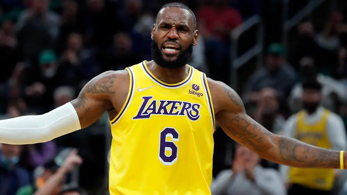 Los Angeles Lakers' LeBron James reacts to a call during the first half of an NBA basketball game against the Boston Celtics, Friday, Nov. 19, 2021, in Boston. (AP Photo/Michael Dwyer)
