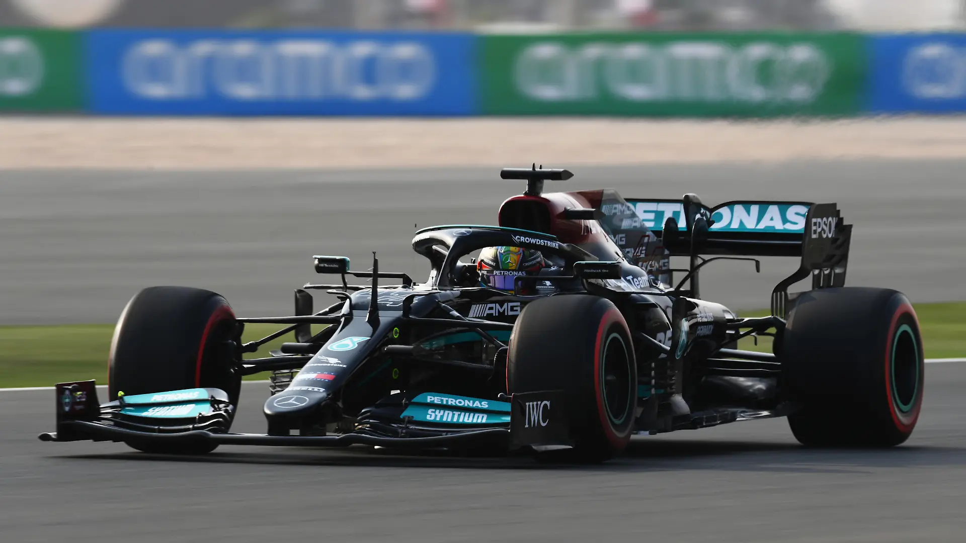 DOHA, QATAR - NOVEMBER 20: Lewis Hamilton of Great Britain driving the (44) Mercedes AMG Petronas F1 Team Mercedes W12 during final practice ahead of the F1 Grand Prix of Qatar at Losail International Circuit on November 20, 2021 in Doha, Qatar. (Photo by Clive Mason/Getty Images)
