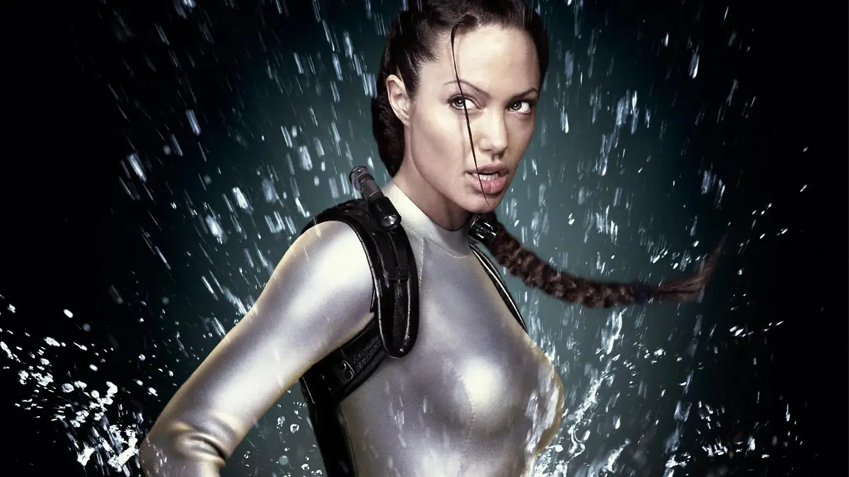 Die Schatzjägerin Lara Croft (Angelina Jolie) im hautengen Latexanzug - Plakatmotiv  des neuen Kinofilm "Tomb Raider 2 - Die Wiege des Lebens". Am 14.8. startet "Tomb Raider 2" in den deutschen Kinos. Auch im zweiten Teil des Hollywood-Blockbusters nach dem gleichnamigen Computerspiel macht Superstar Angelina Jolie in der Rolle der Actionheldin Lara Croft eine gute Figur. Diesmal ist sie auf der Suche nach der Büchse der Pandora, die in einem Tempel tief unten im Meer liegt. Dabei muss die Action-Amazone im hautengen Latexanzug wieder allerlei Gefahren bestehen.