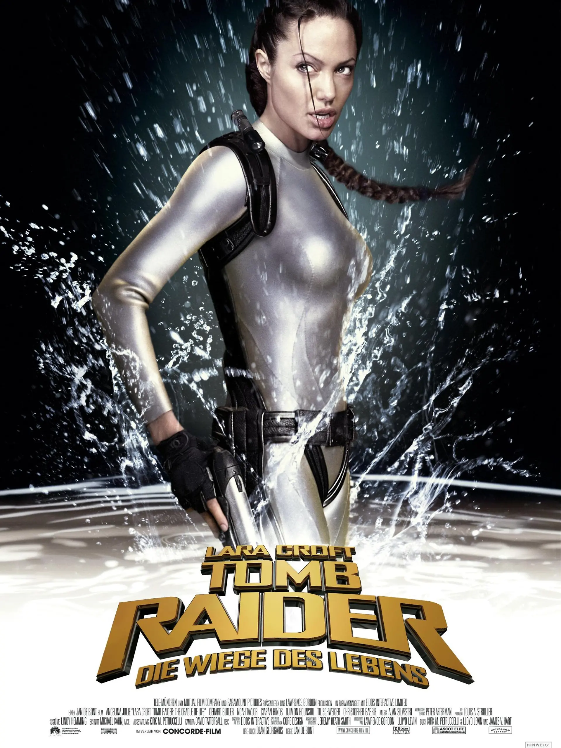 Die Schatzjägerin Lara Croft (Angelina Jolie) im hautengen Latexanzug - Plakatmotiv  des neuen Kinofilm "Tomb Raider 2 - Die Wiege des Lebens". Am 14.8. startet "Tomb Raider 2" in den deutschen Kinos. Auch im zweiten Teil des Hollywood-Blockbusters nach dem gleichnamigen Computerspiel macht Superstar Angelina Jolie in der Rolle der Actionheldin Lara Croft eine gute Figur. Diesmal ist sie auf der Suche nach der Büchse der Pandora, die in einem Tempel tief unten im Meer liegt. Dabei muss die Action-Amazone im hautengen Latexanzug wieder allerlei Gefahren bestehen.