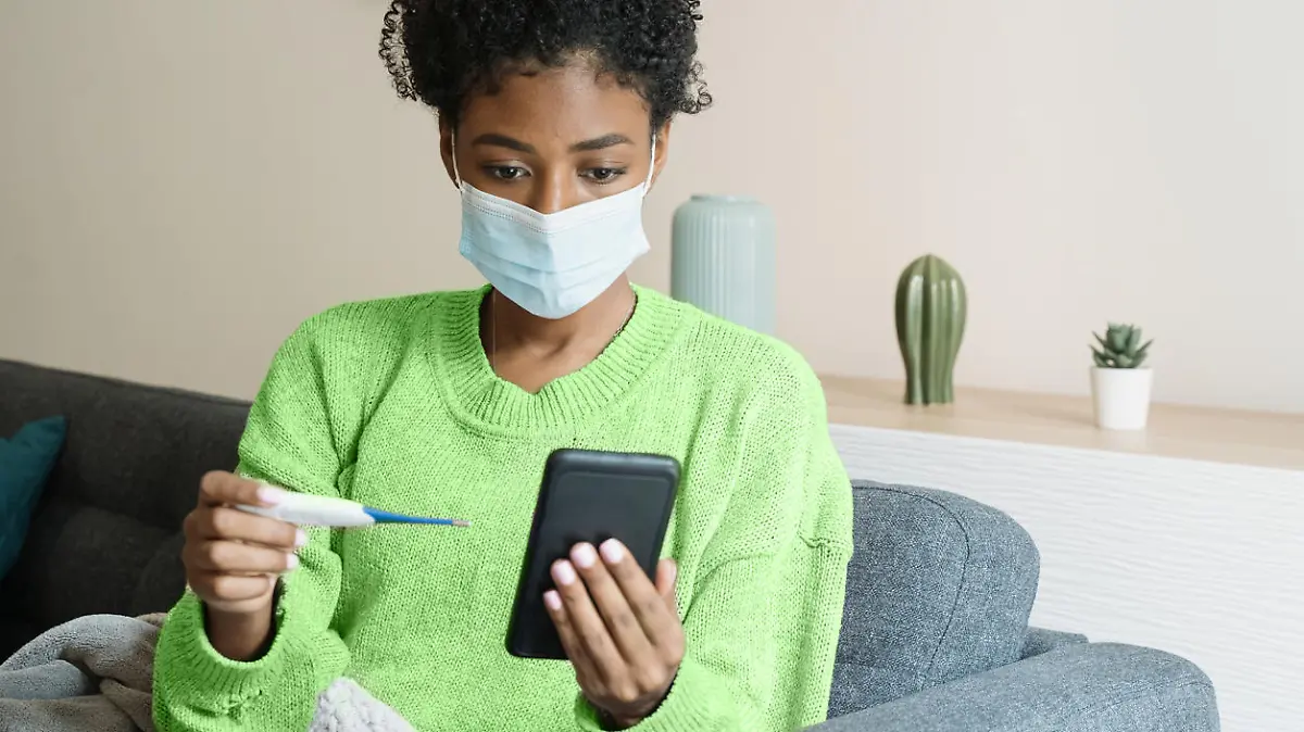 Black woman feeling sick and suffering seasonal flu symptoms