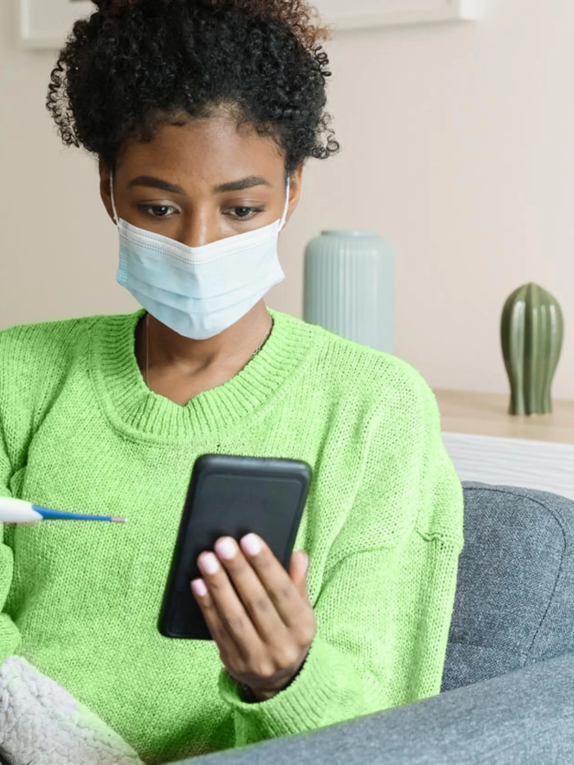 Black woman feeling sick and suffering seasonal flu symptoms